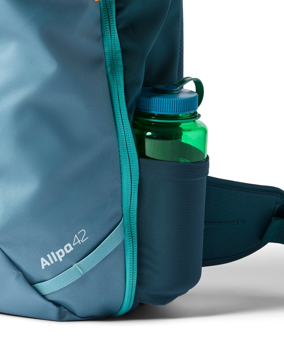 Cotopaxi Allpa 42L Travel Pack in Blue Spruce/Abyss — angle view 3