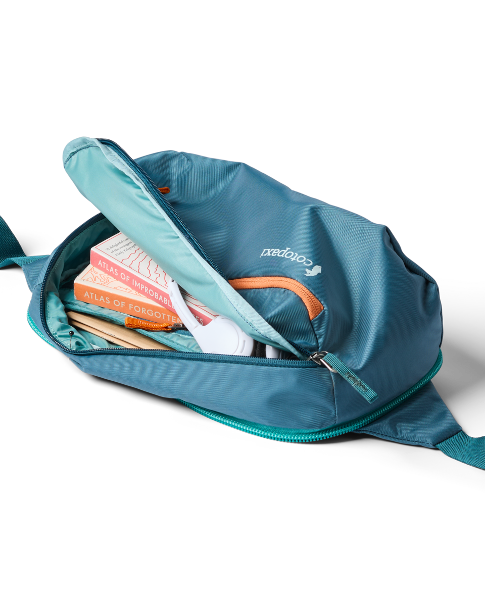 Cotopaxi Allpa 50L Adventure Travel Pack in Blue Spruce/Abyss — lifestyle