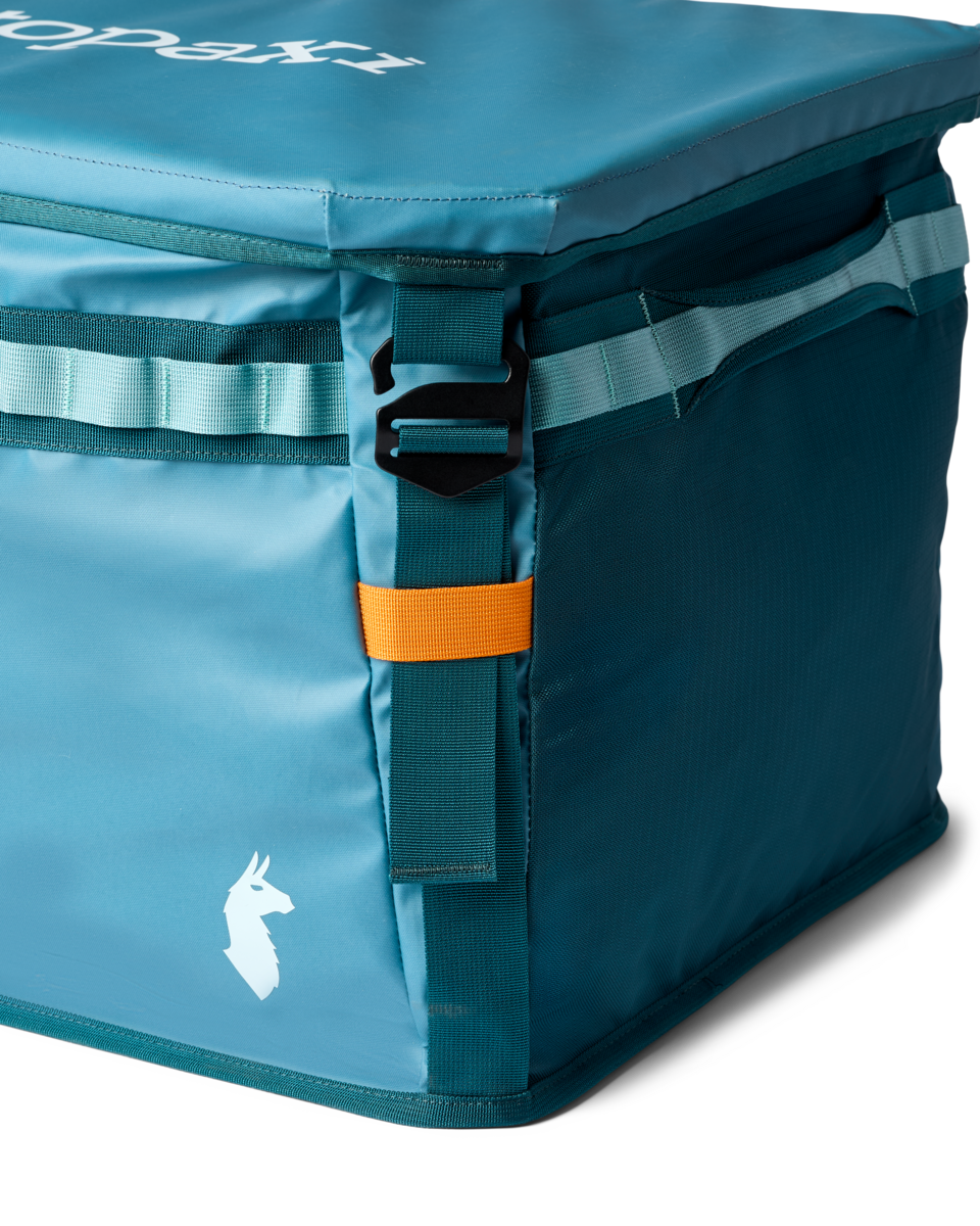 Cotopaxi Allpa 60L Gear Hauler Box in Blue Spruce/Abyss — angle view 2