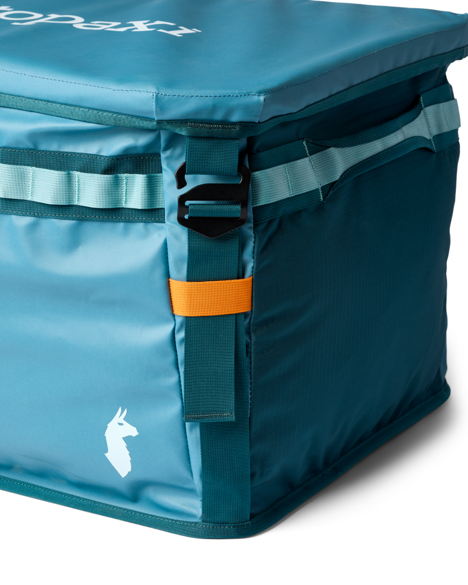 Cotopaxi Allpa 90L Gear Hauler Box in Blue Spruce/Abyss — angle view 3