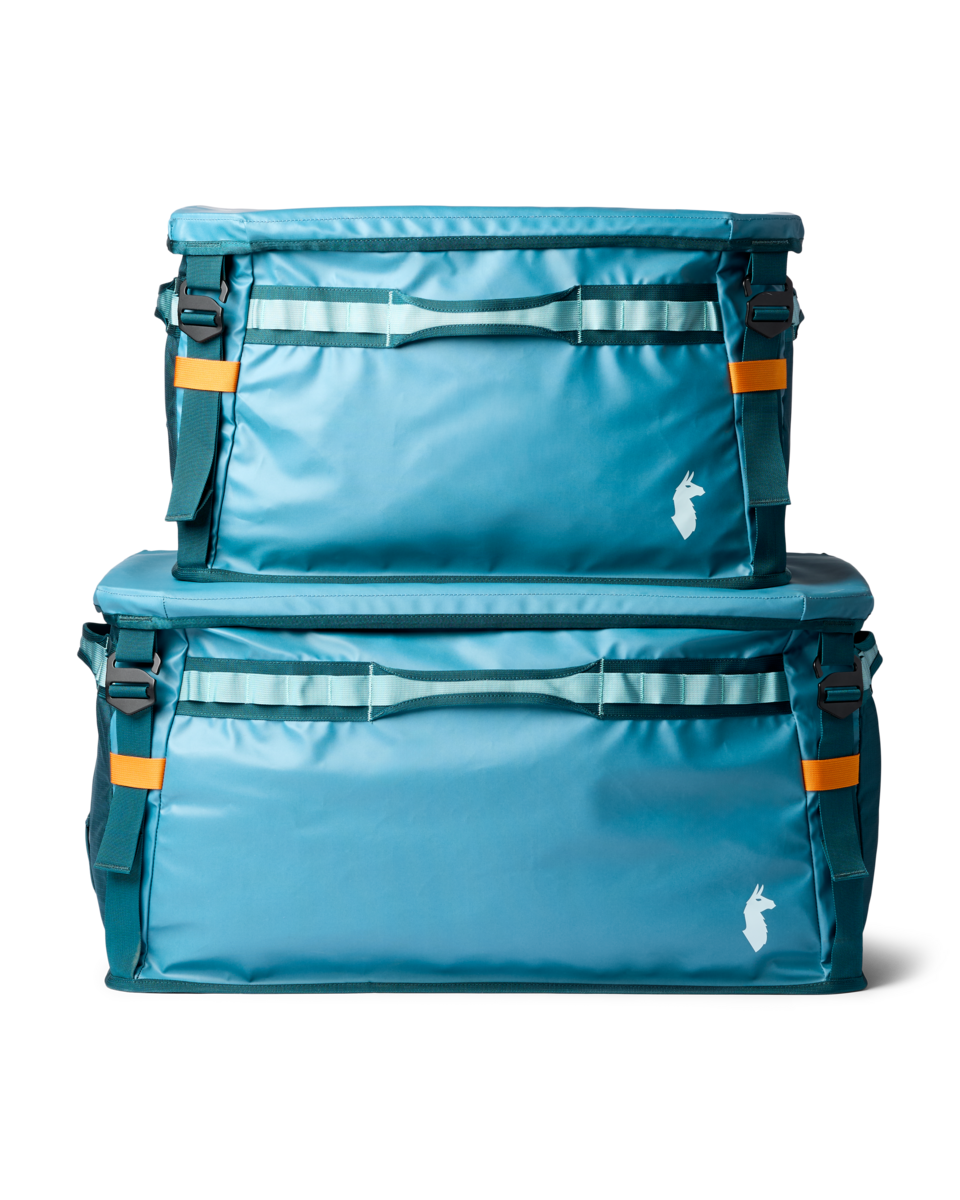 Cotopaxi Allpa 90L Gear Hauler Box in Blue Spruce/Abyss — lifestyle