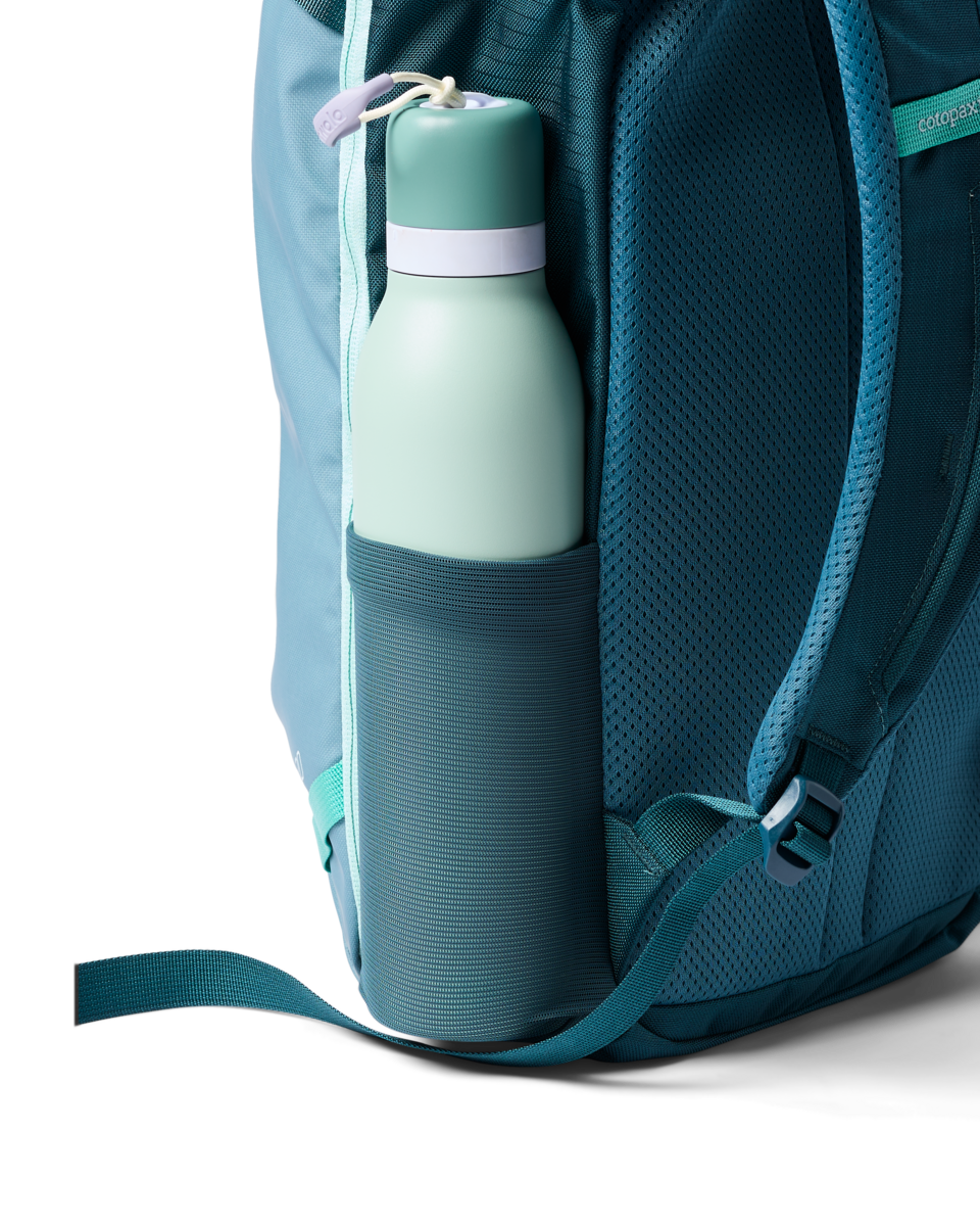 Cotopaxi Allpa Mini 20L Travel Pack in Blue Spruce — angle view 2