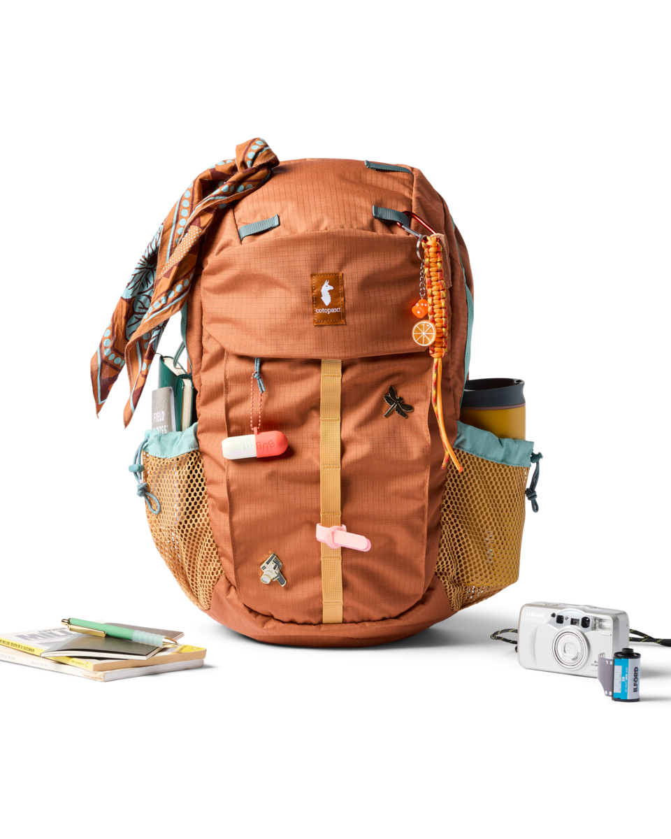Cotopaxi Clase 28L Daypack in Whiskey — lifestyle