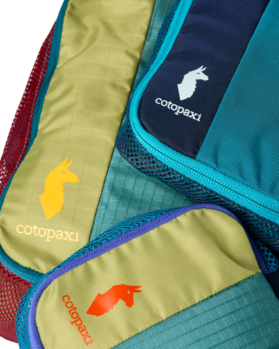 Cotopaxi Cubo Packing Travel Bundle in Del Día — back view