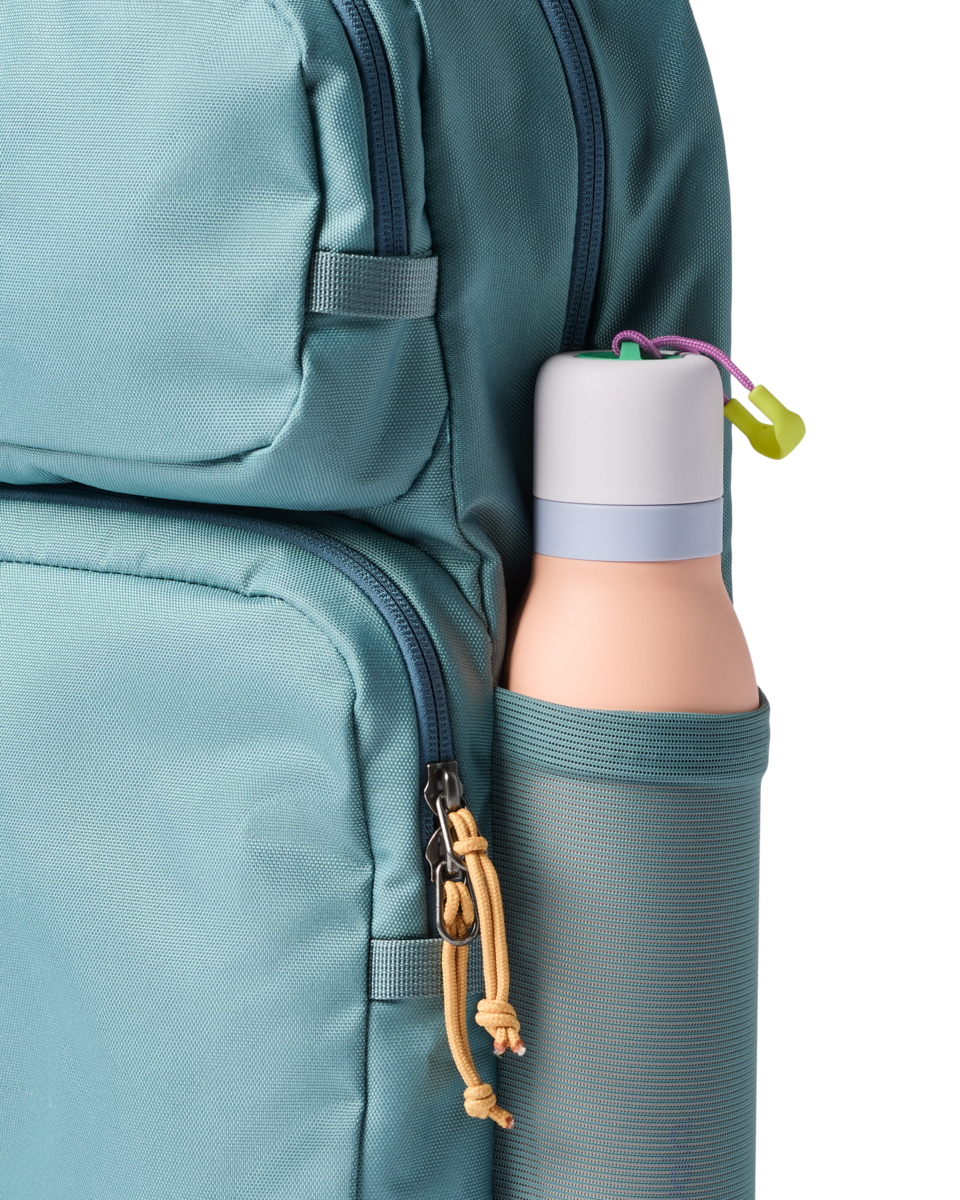 Cotopaxi Tasra 16L Backpack in Everglade — angle view 1