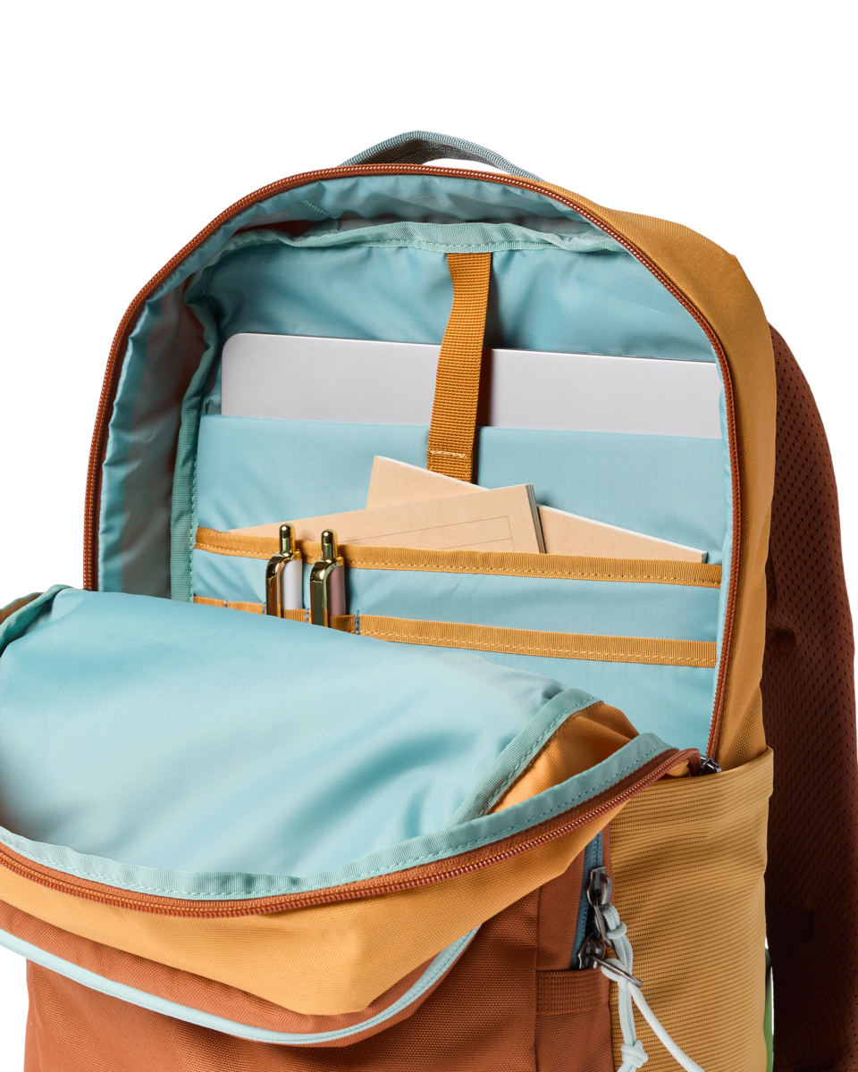 Cotopaxi Tasra 16L Backpack in Whiskey and Honeycomb — angle view 3