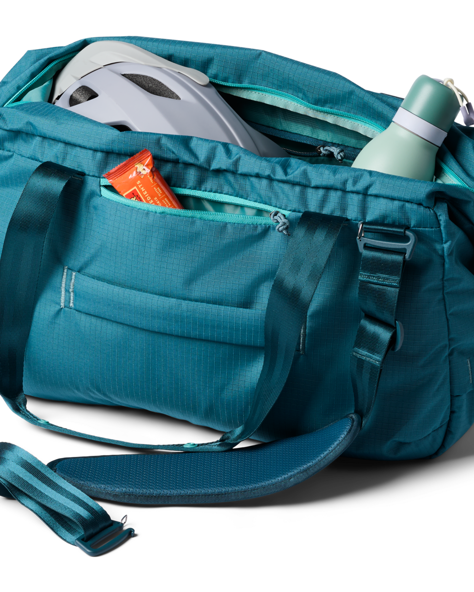 Cotopaxi Viaje 35L Travel Duffel in Blue Spruce — angle view 3