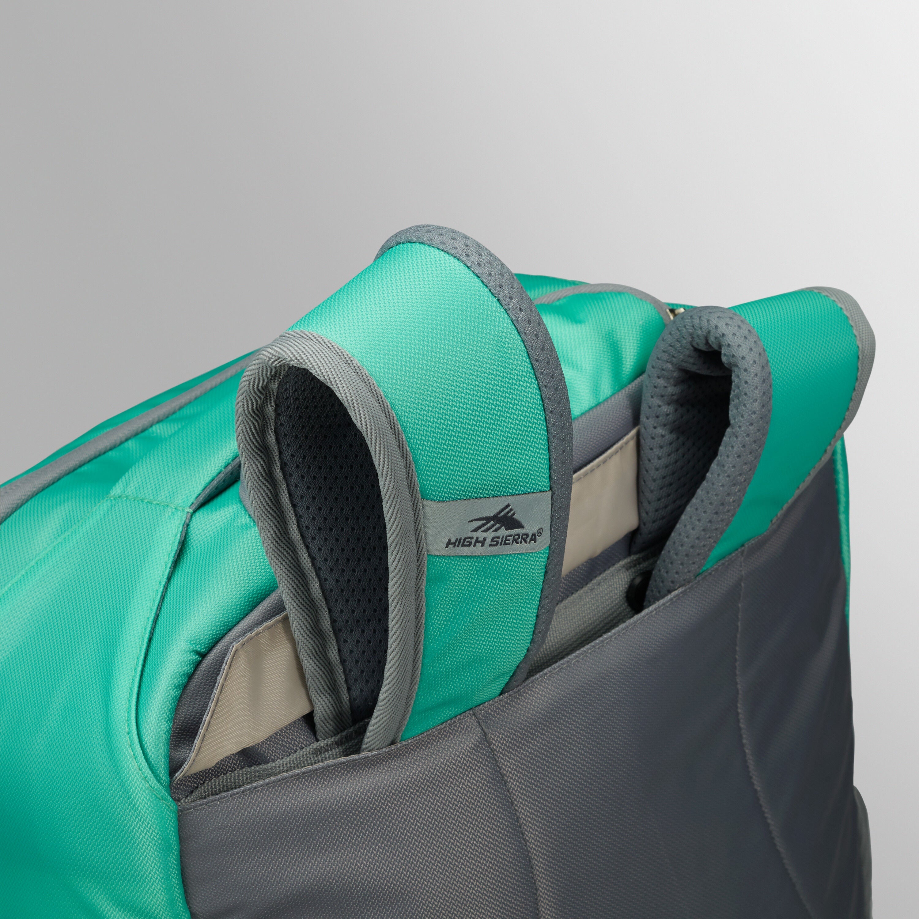High Sierra Freewheel Pro Wheeled Backpack in Aquamarine White — angle view 2