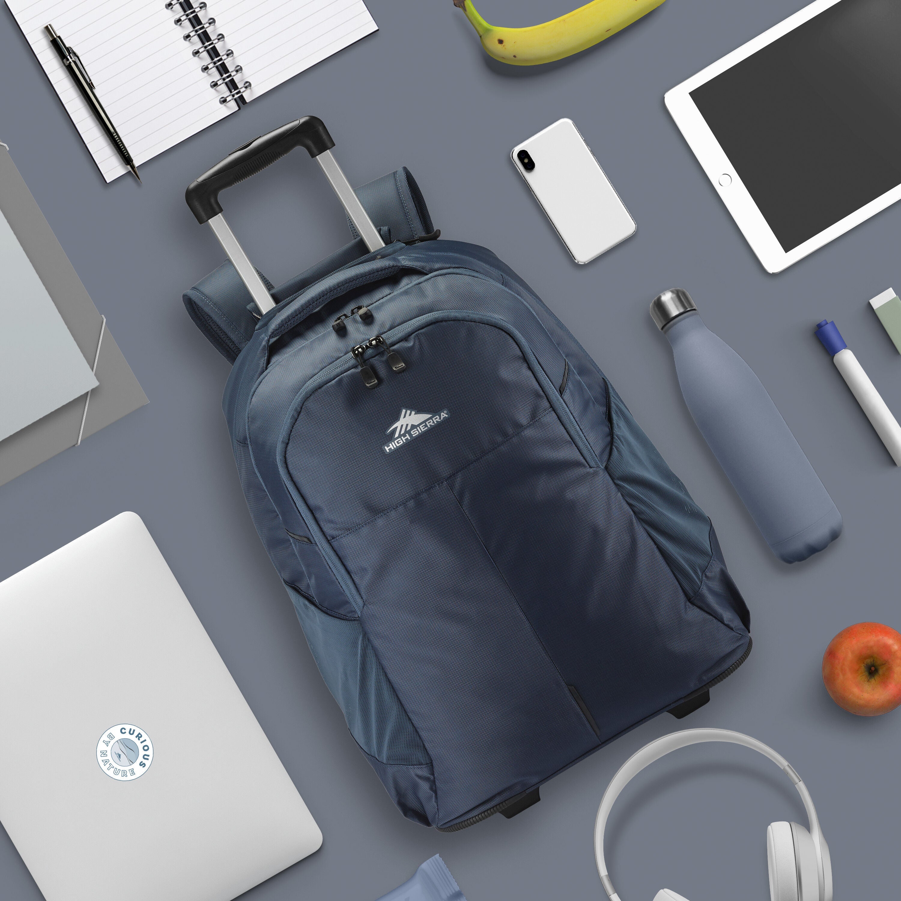 High Sierra Powerglide Pro Wheeled Backpack in Indigo Blue — angle view 4