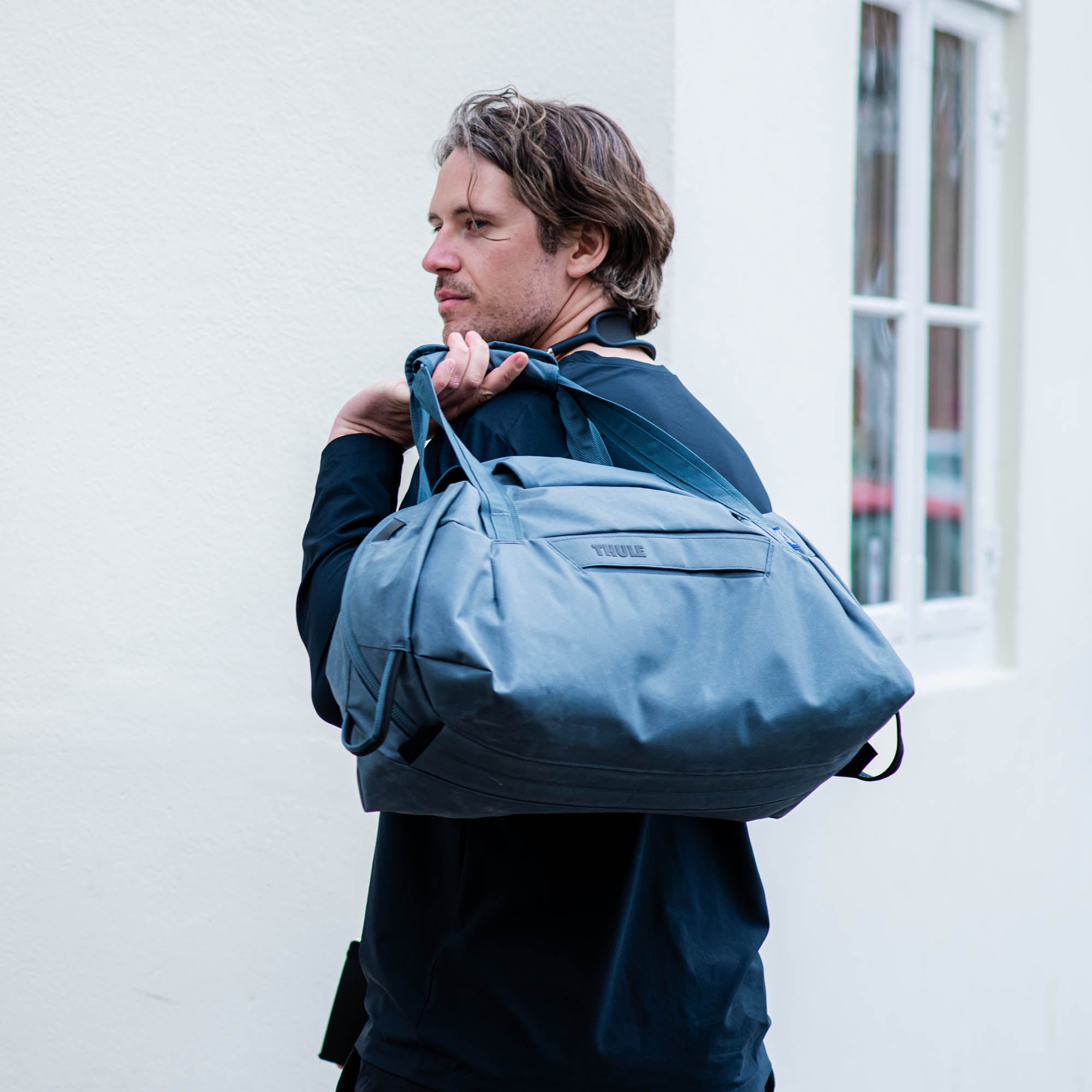Thule Aion Duffel Bag 35L in Dark Slate — lifestyle 2 # color_Dark Slate