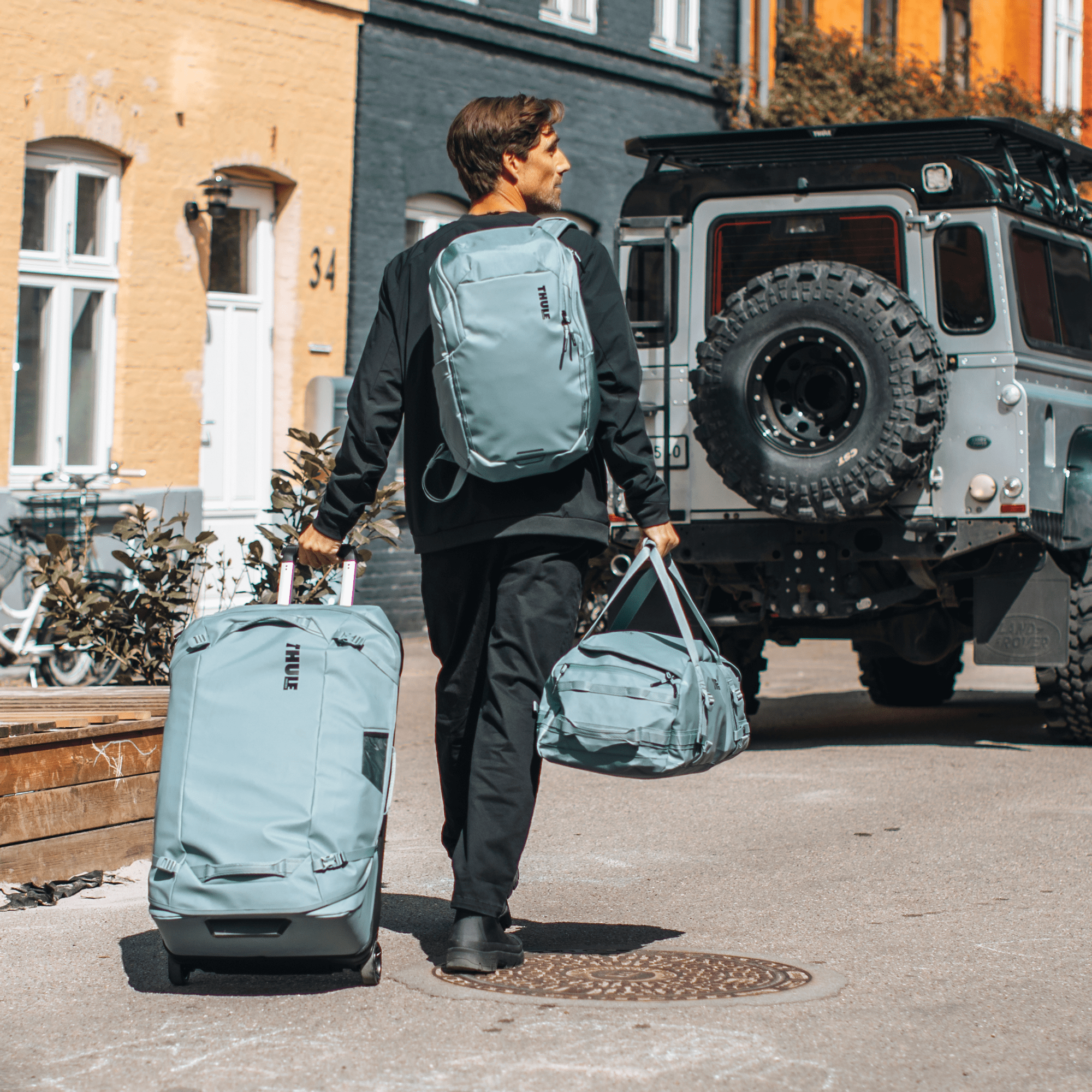 Thule Chasm 70L Duffel in Pond Gray — lifestyle 2 # color_Pond Gray