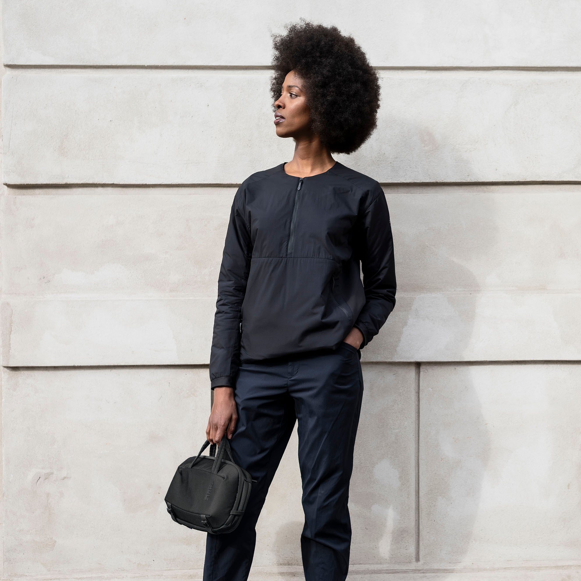 Thule Subterra Crossbody 5L in Black — lifestyle 2 # color_Black