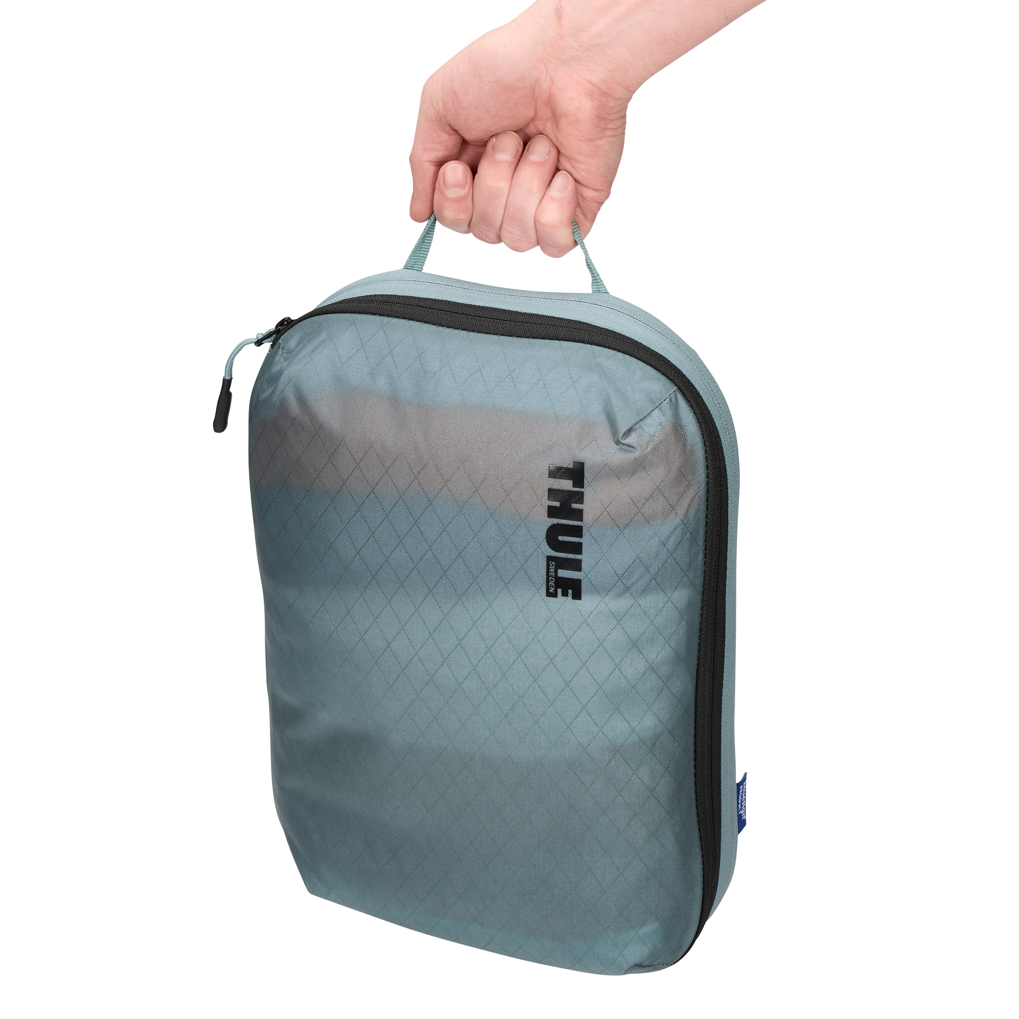 Thule Compression Packing Cube Medium in Pond Gray — lifestyle # color_Pond Gray