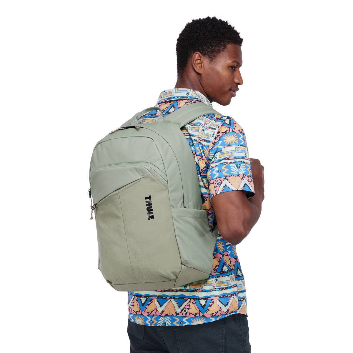 Thule Indago Backpack 23L in Quiet Green — lifestyle