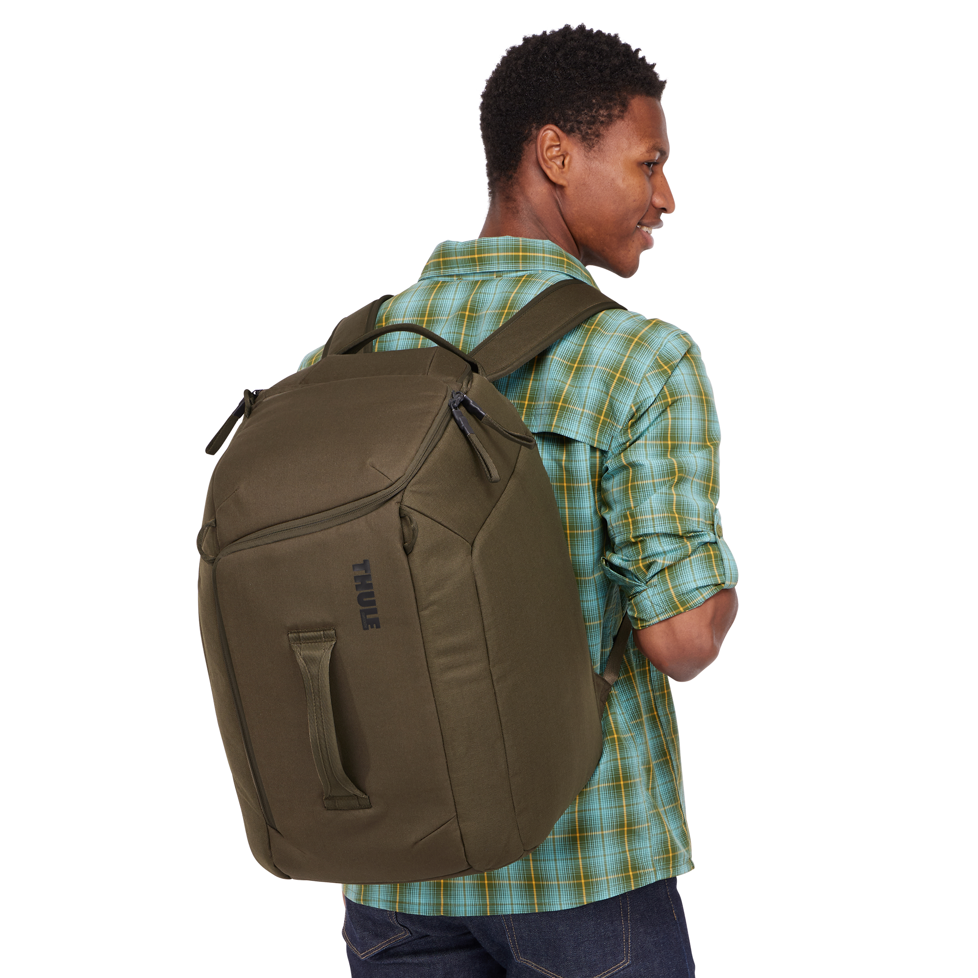 Thule RoundTrip Boot Backpack 45L in Deep Khaki — lifestyle # color_Deep Khaki