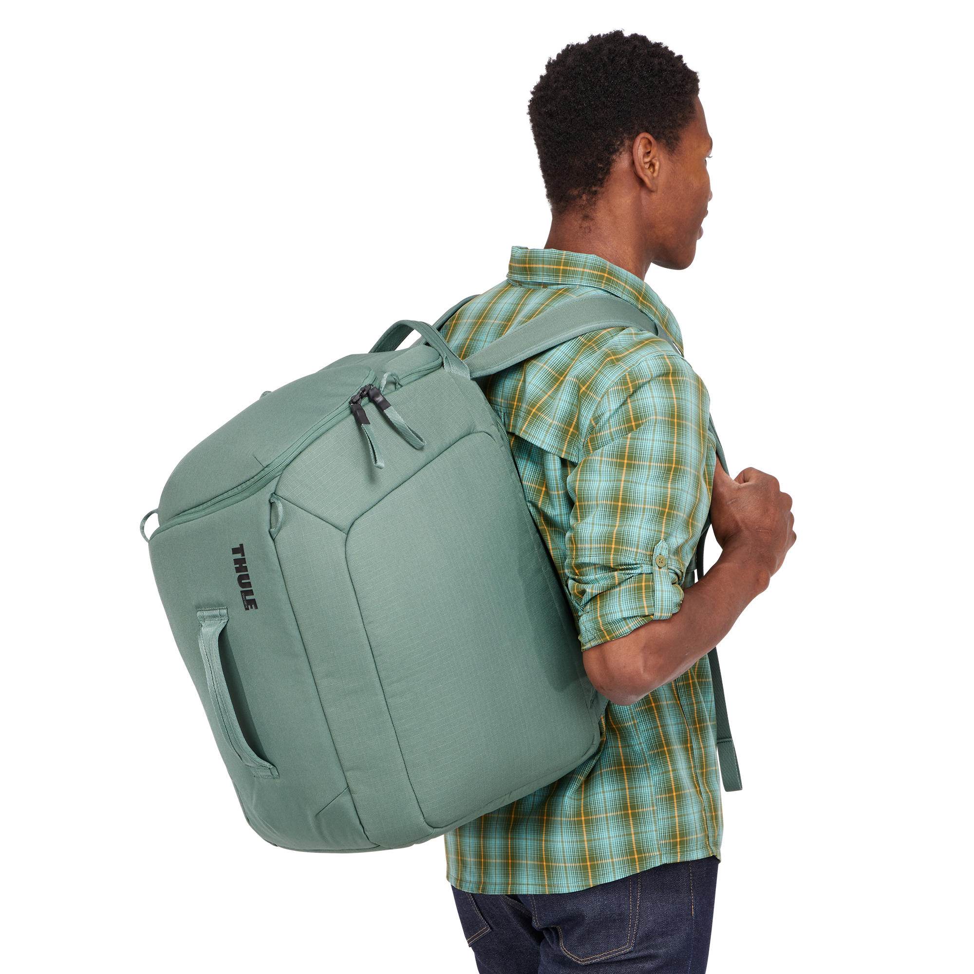 Thule RoundTrip Boot Backpack 45L in Hazy Green — lifestyle # color_Hazy Green