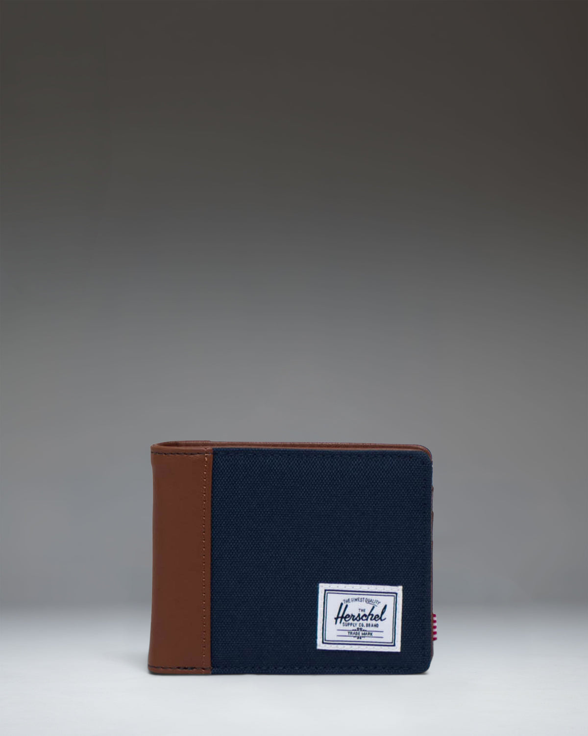 Herschel Hank Wallet RFID in Navy/Tan — front view