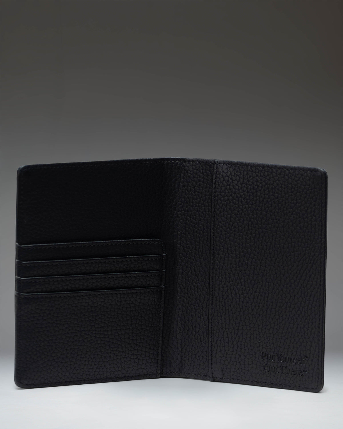 Herschel Raynor Passport Holder Vegan Leather in Black — interior view
