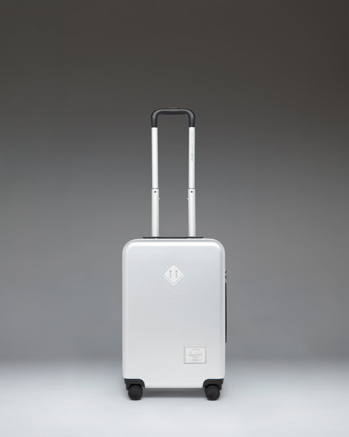 Herschel Heritage Hardshell Large Carry-On Luggage in Silver — front view