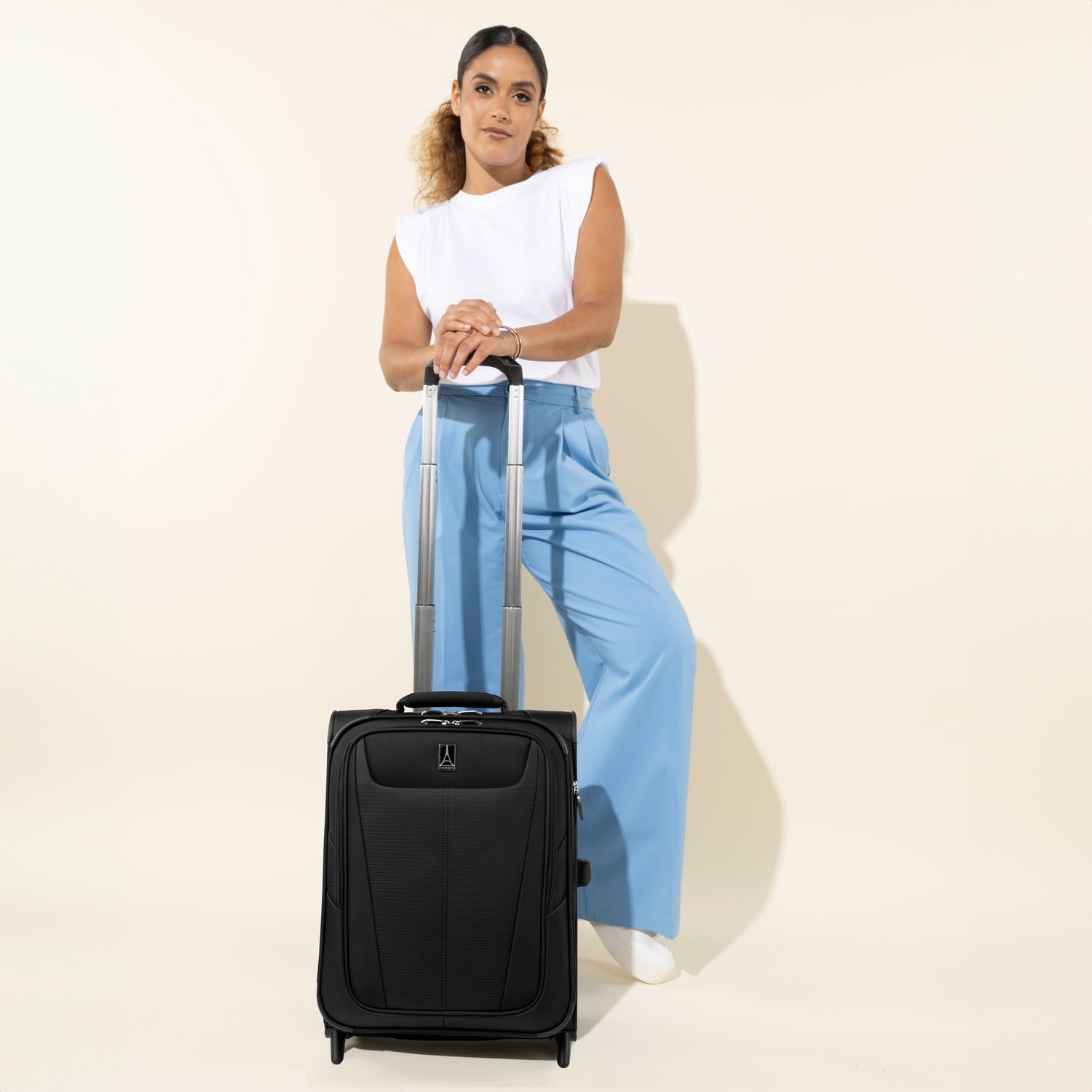 Travelpro Maxlite 5 International Carry-On Expandable Rollaboard in Orchid Pink — angle view 1