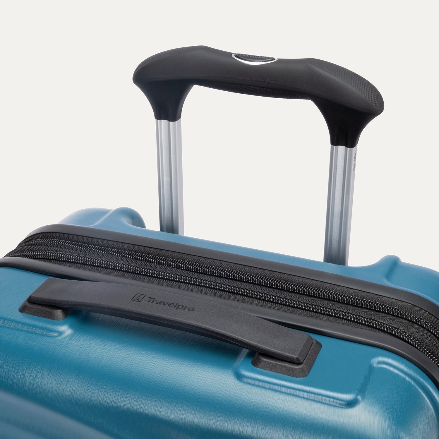 Travelpro Maxlite Air V2 Compact Carry-On Hardside Spinner in Teal — lifestyle