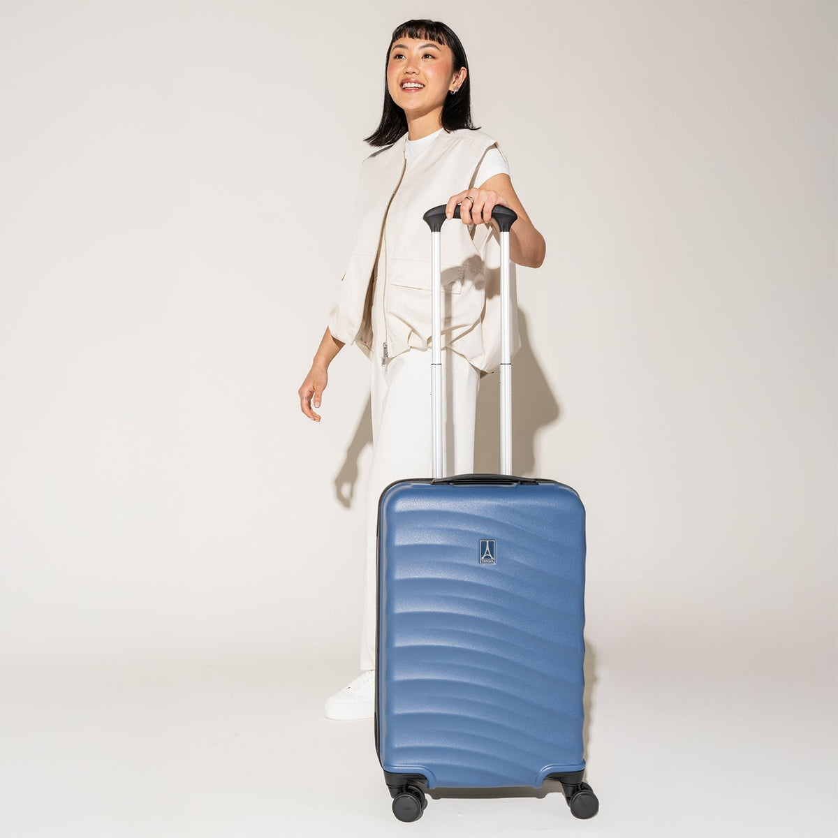 TravelPro Maxlite Air V2 Carry-On Hardside Spinner in Ensign Blue — lifestyle