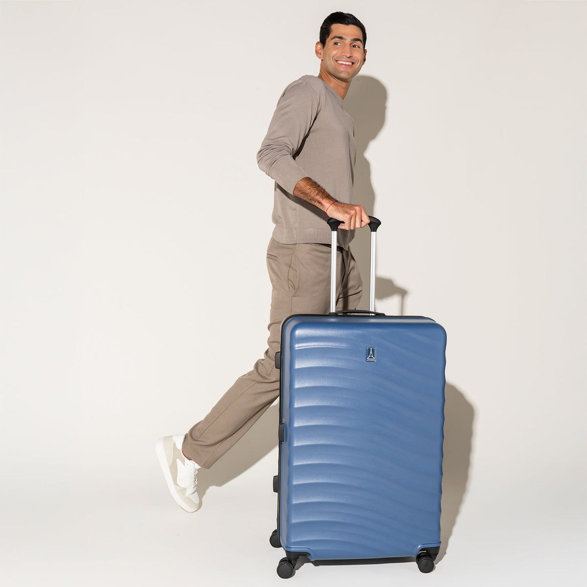 TravelPro Maxlite Air V2 Large Check-In Hardside Spinner in Ensign Blue — lifestyle