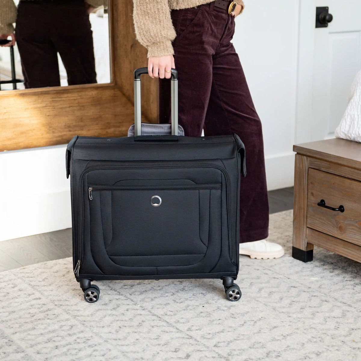 Delsey Helium DLX Large Rolling Garment Bag in Black — lifestyle 2 # color_Black