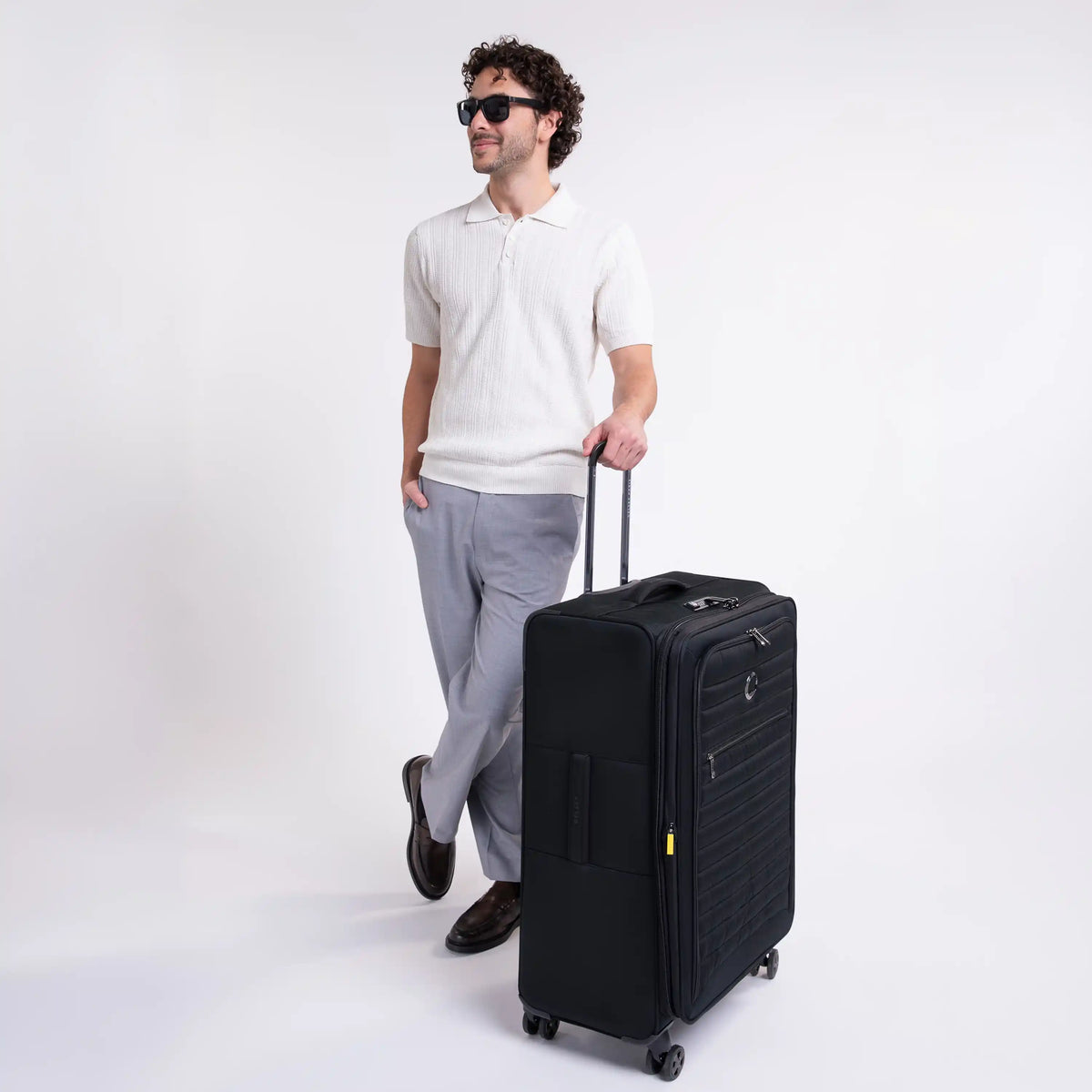 Delsey Cruise 3.0 Softside Large Expandable Spinner in Black — lifestyle # color_Black