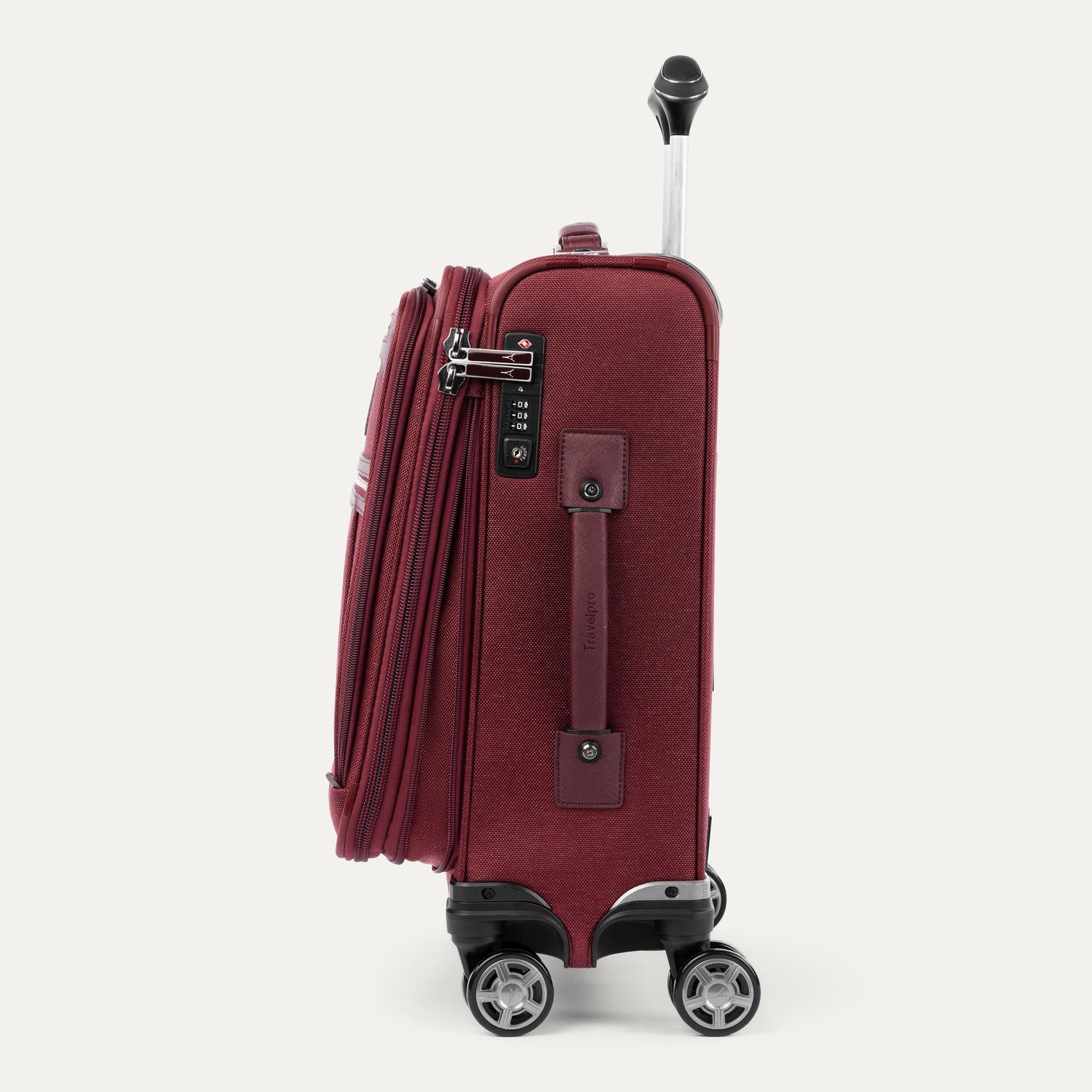 Travelpro Platinum Elite International Carry-On Expandable Spinner in Bordeaux — angle view 2
