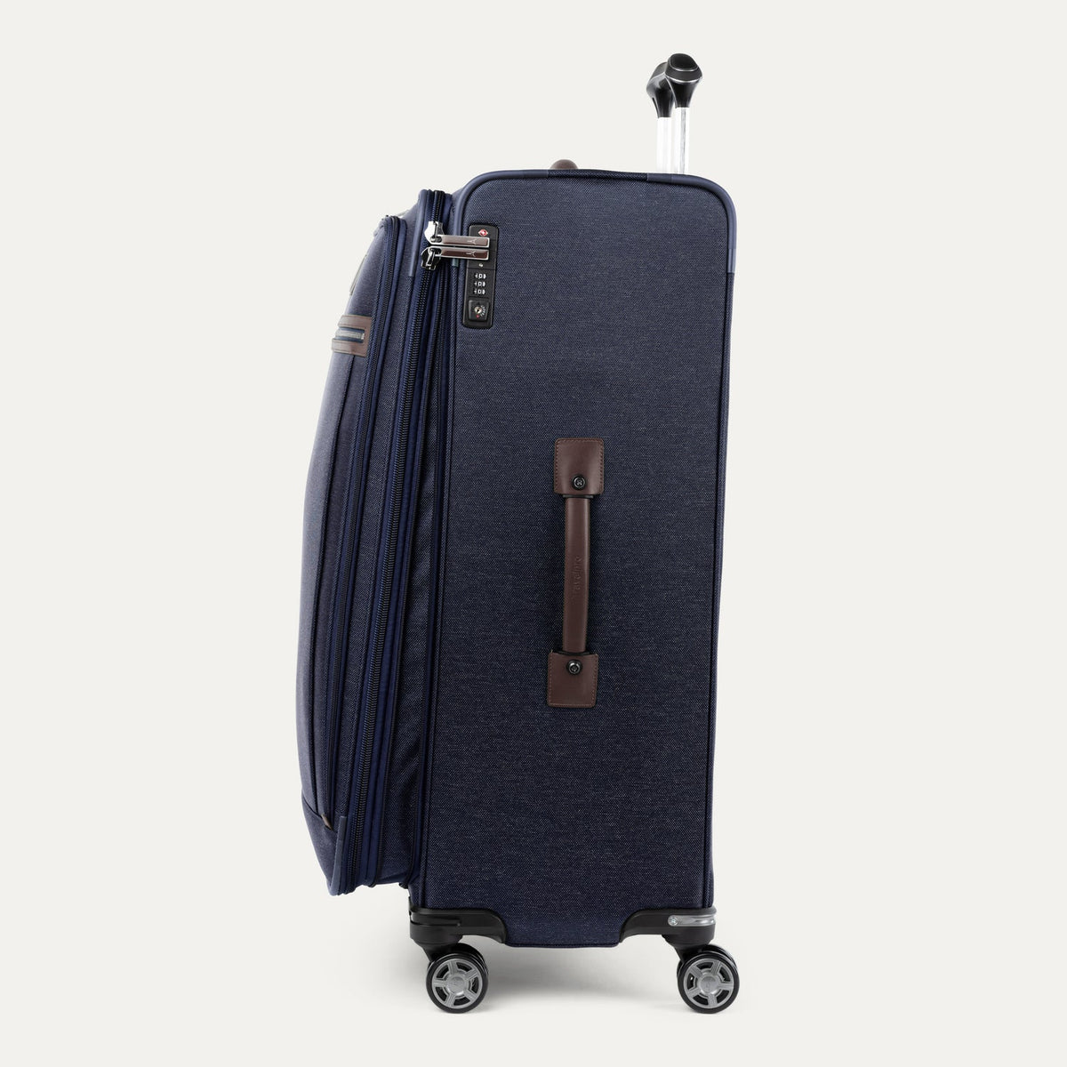 Travelpro Platinum Elite 29” Expandable Spinner in True Navy — angle view 2