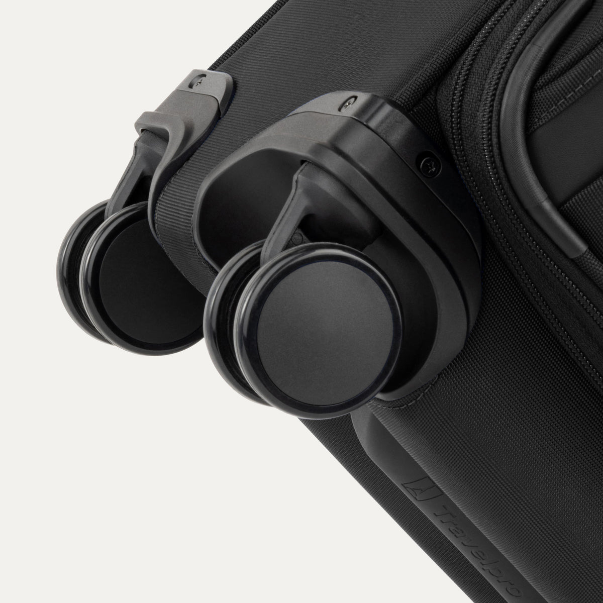 Travelpro VersaPack+ Carry-On Spinner in Black — detail view