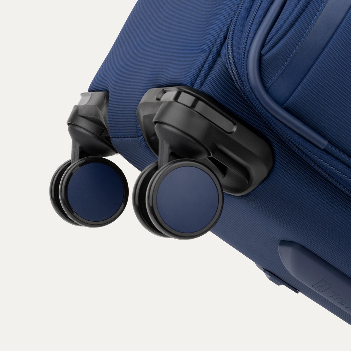 Travelpro VersaPack+ Medium Check-In Spinner in Estate Blue — detail view