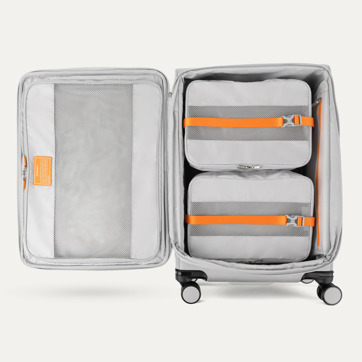 Travelpro VersaPack+ Medium Check-In Spinner in Marigold Orange — interior view