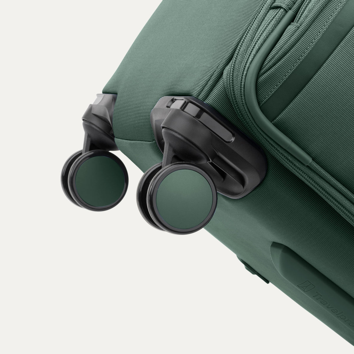 Travelpro VersaPack+ Large Check-In Spinner in Desert Sage Green — detail view