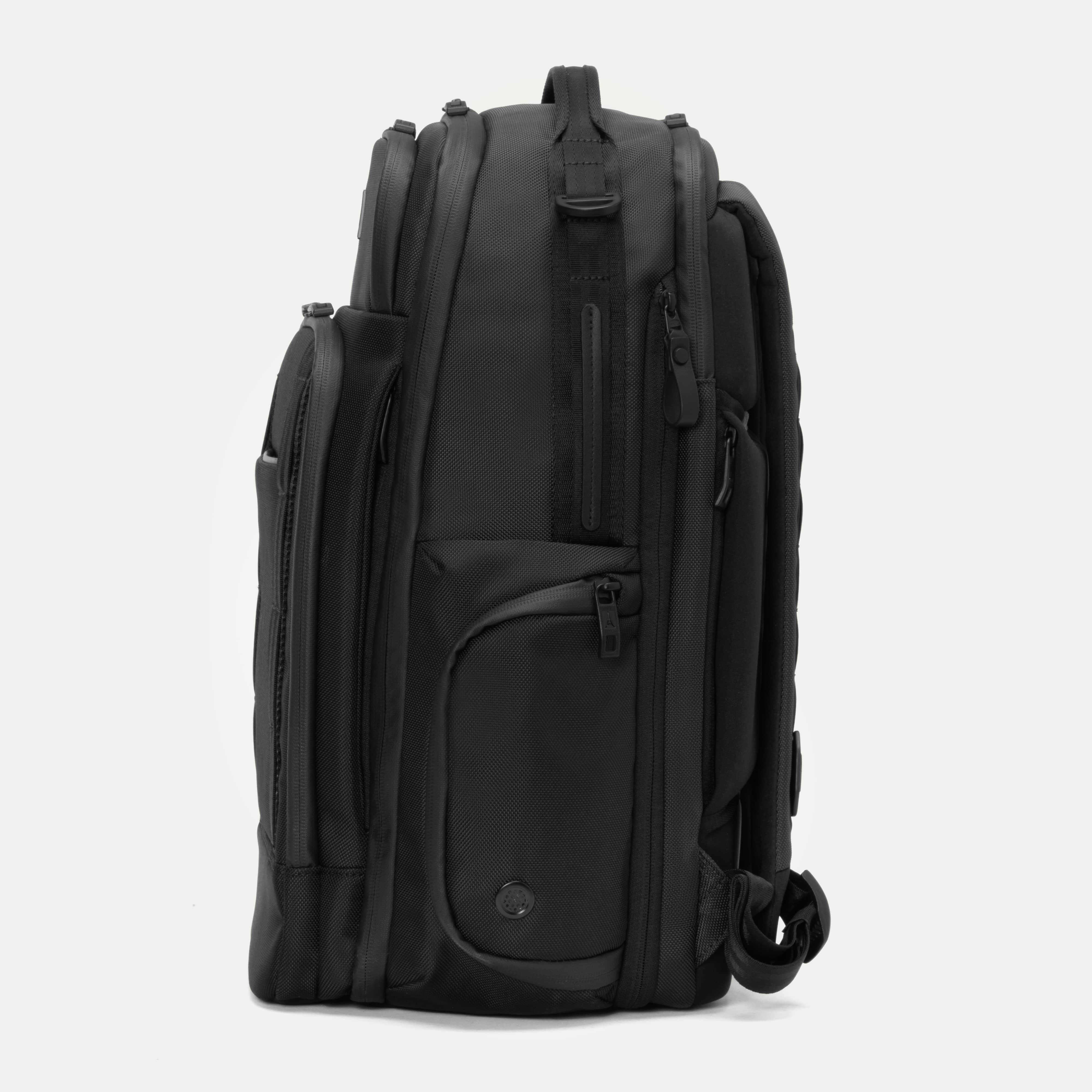 Travelpro Altitude Large Expandable Laptop Backpack 30-36L in Jet Black — angle view 1