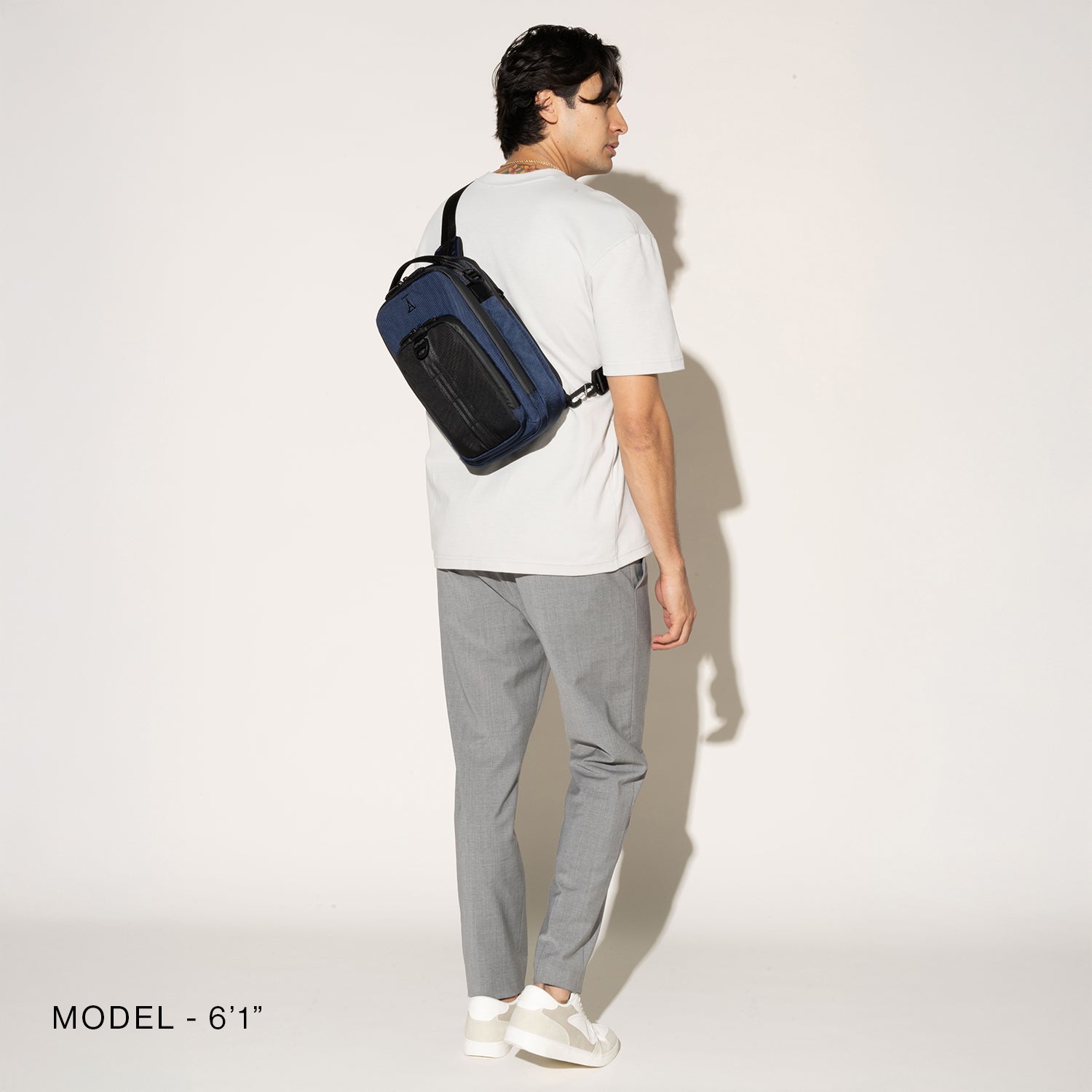 Travelpro Altitude Crossbody 6L in Aviator Navy — angle view 2