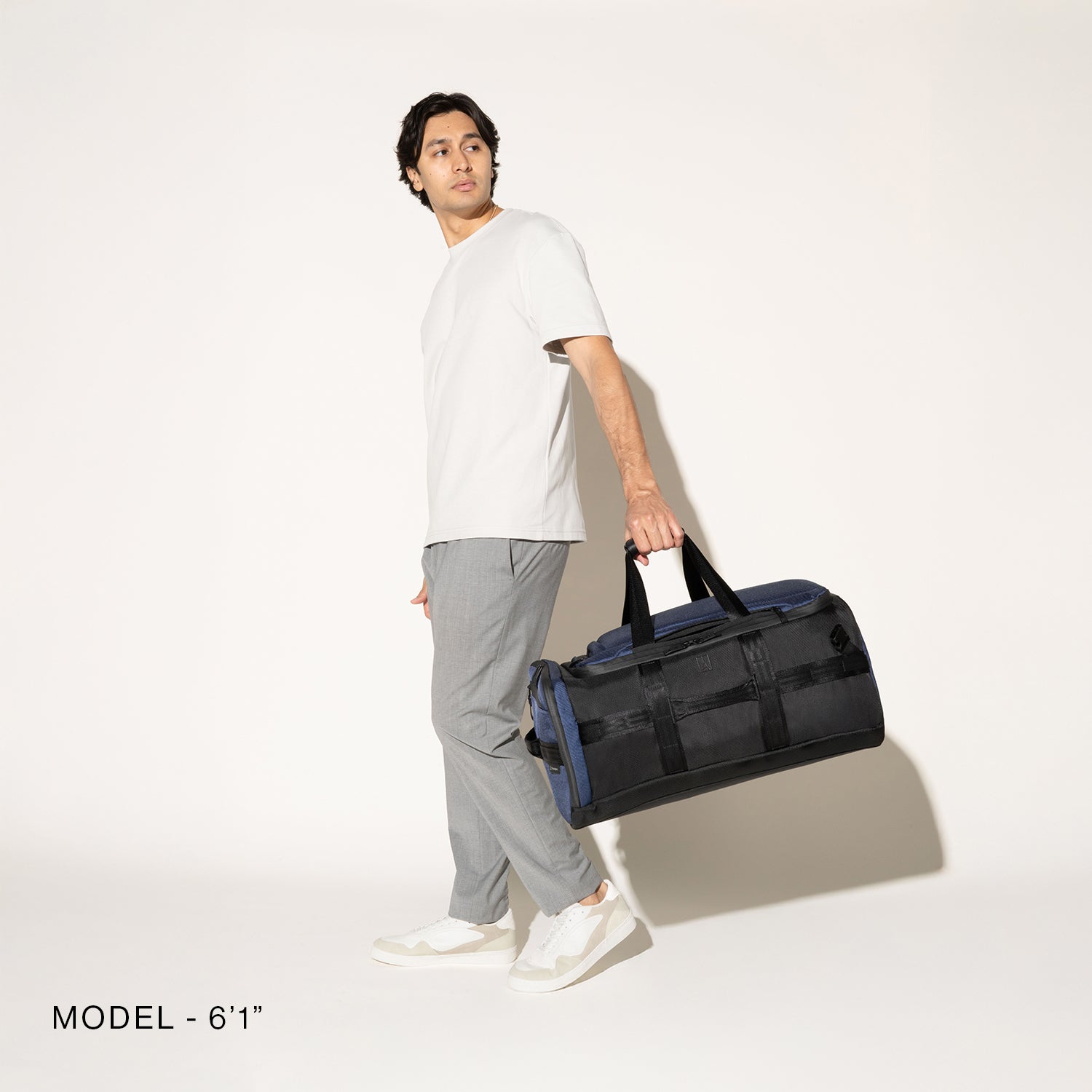 Travelpro Altitude Convertible Duffel/Backpack in Aviator Navy — angle view 1