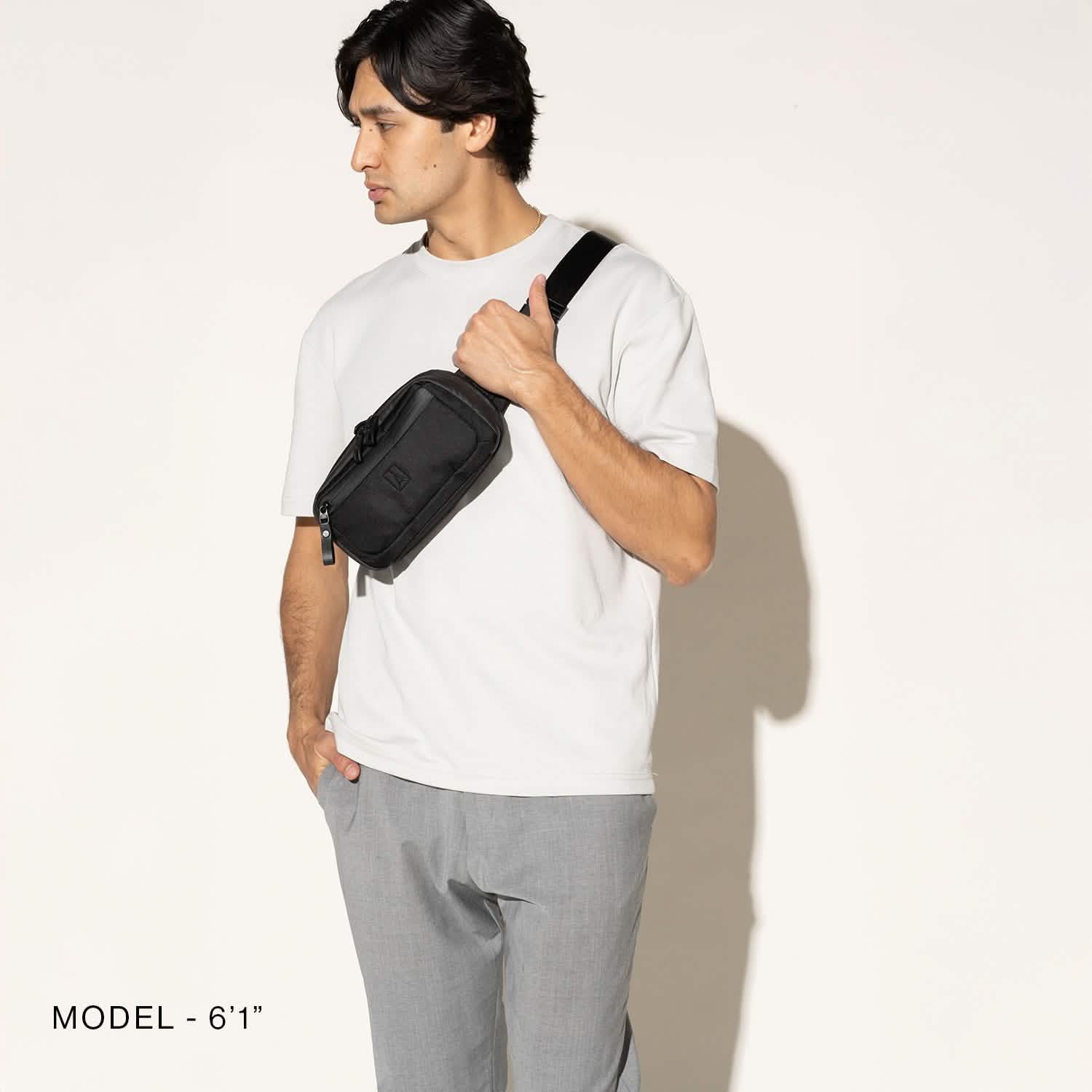Travelpro Altitude Sling 2L in Jet Black — angle view 2
