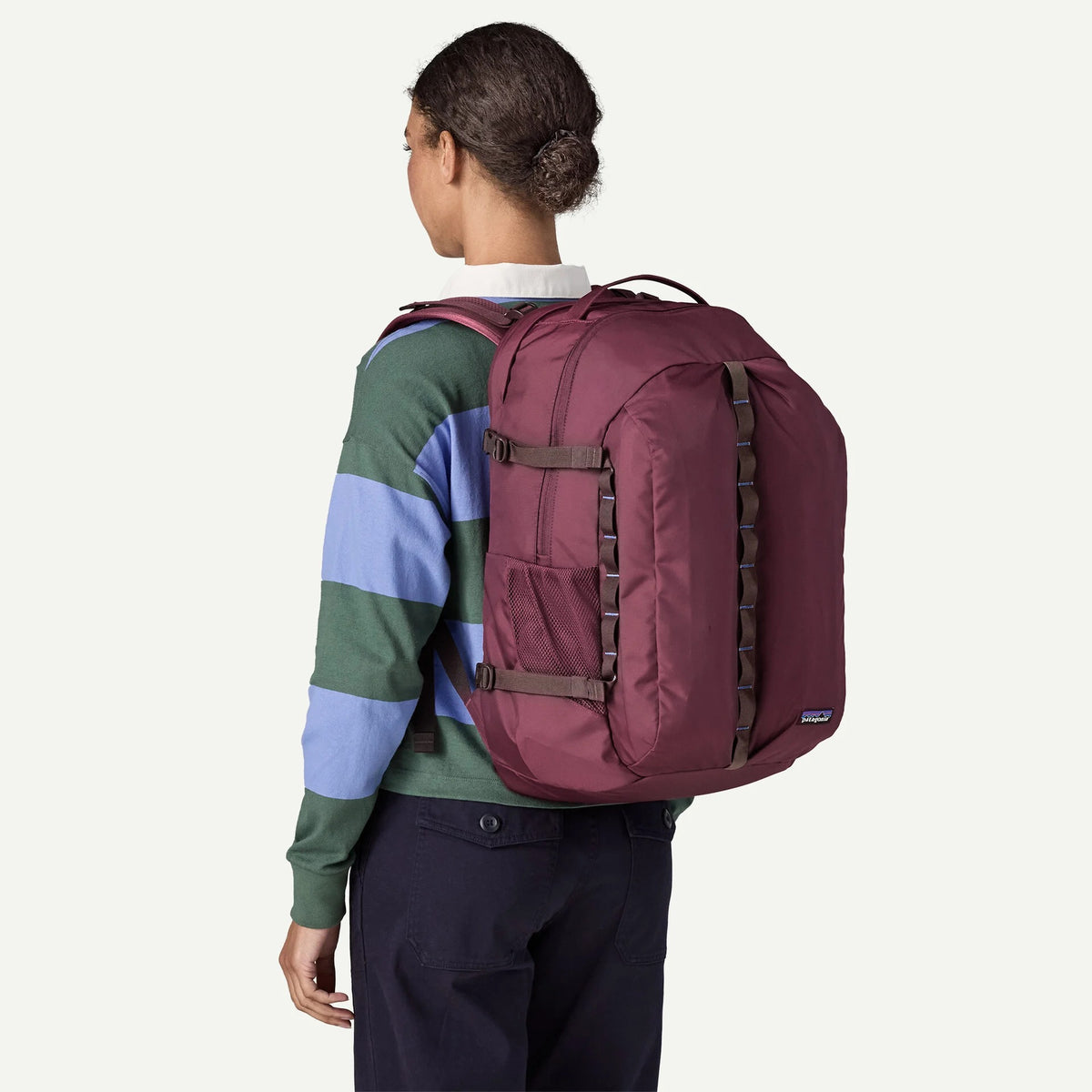 Patagonia Refugio Daypack 32L in Berry Fig — lifestyle # color_Berry Fig