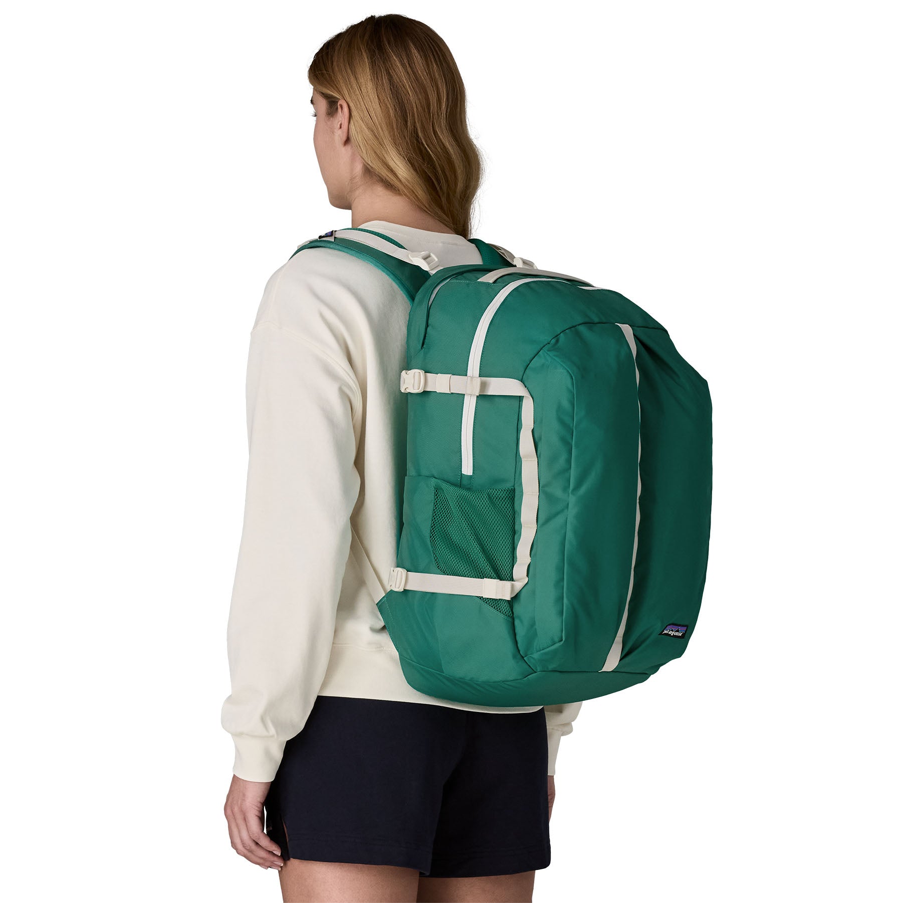 Patagonia Refugio Daypack 32L in Gem Green — lifestyle