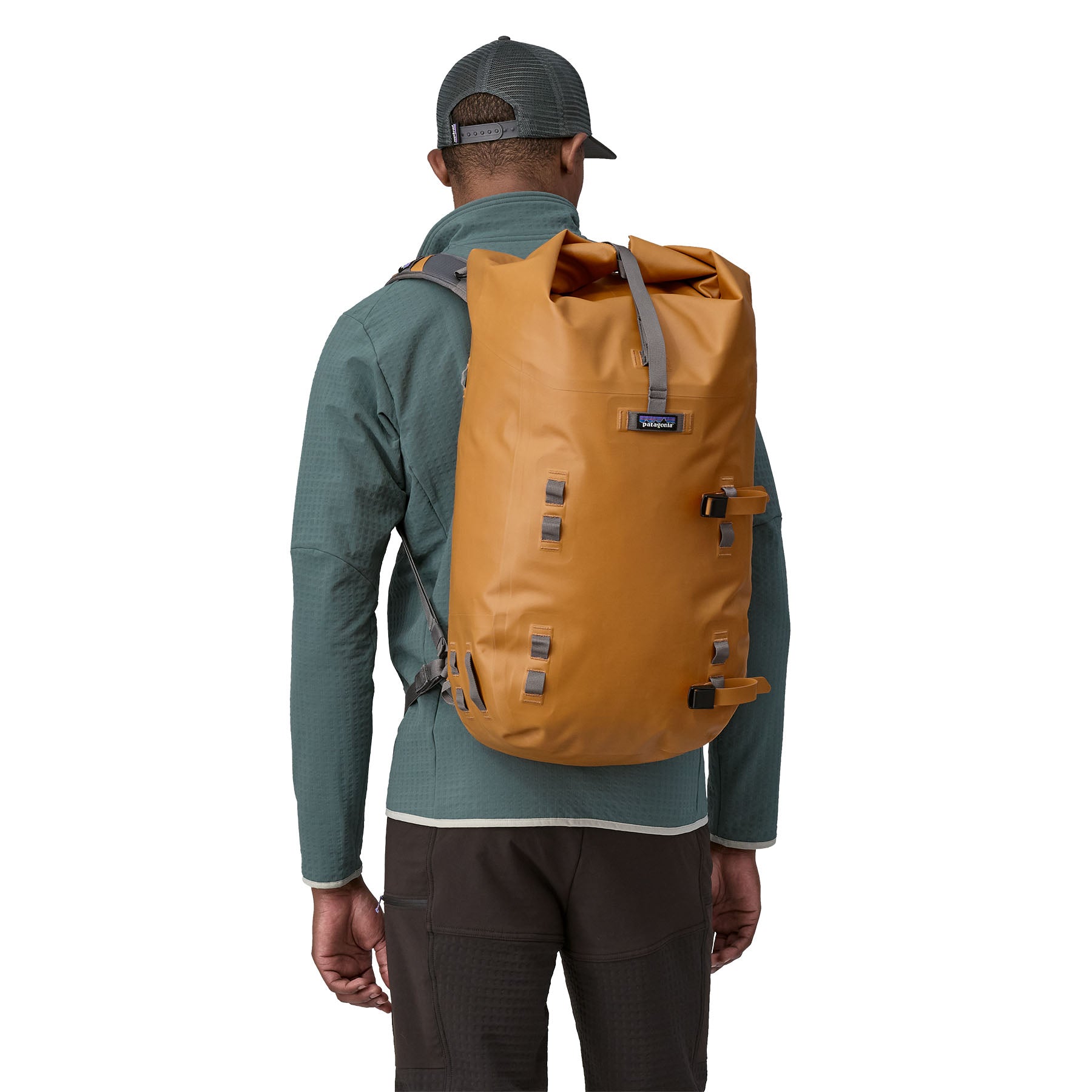 Patagonia Disperser Roll-Top Pack 40L in Golden Caramel — lifestyle