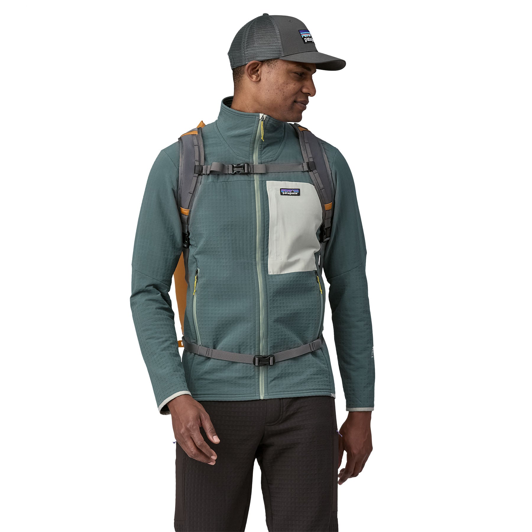 Patagonia Disperser Roll-Top Pack 40L in Golden Caramel — lifestyle 2
