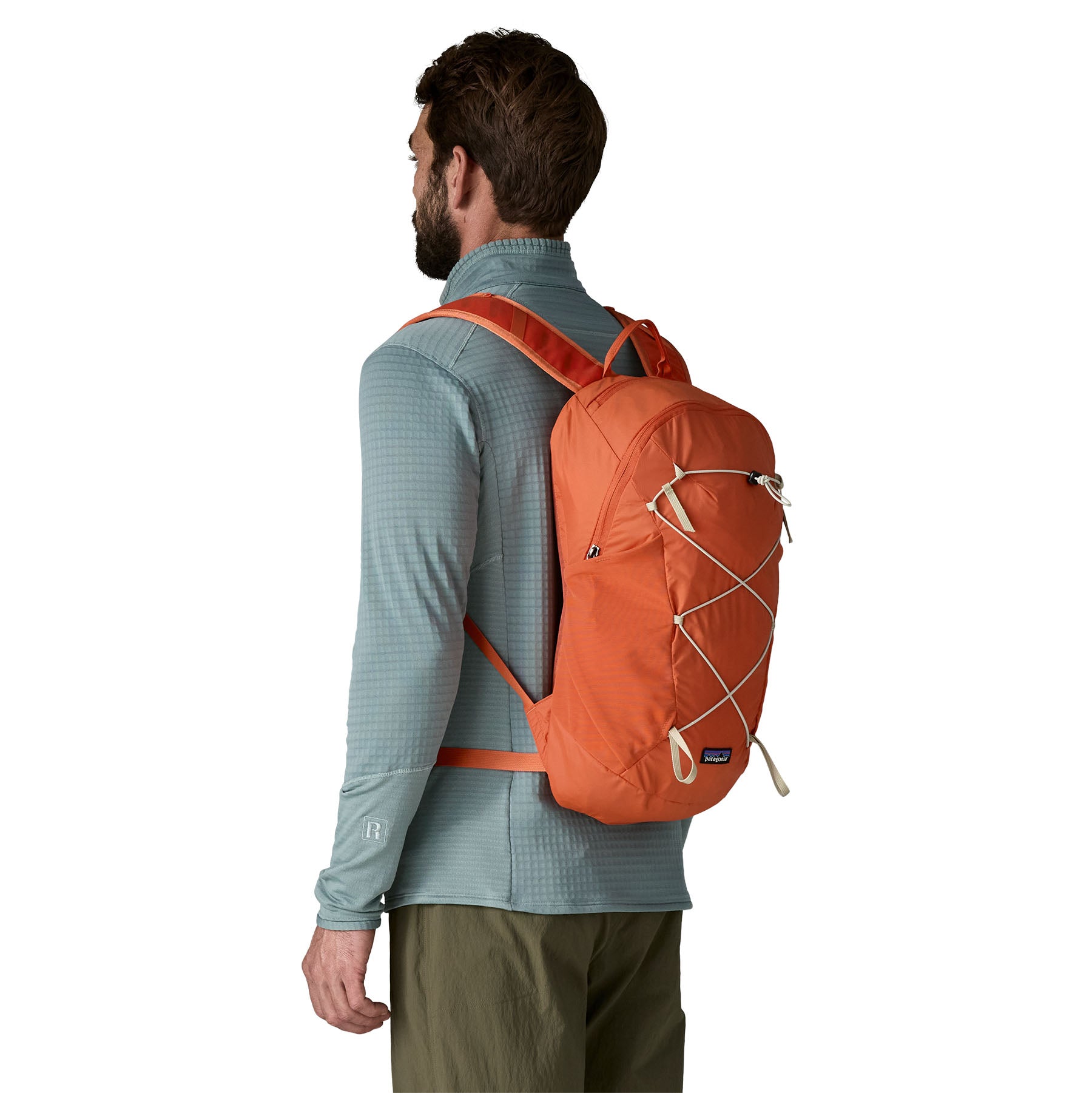Patagonia Terravia Pack 14L in Coal Orange — lifestyle