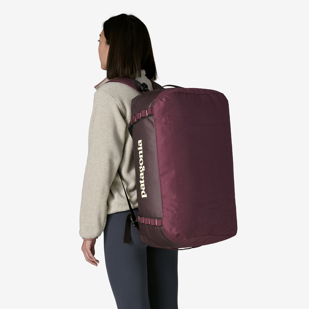 Patagonia Black Hole Duffel 55L in Berry Fig — lifestyle