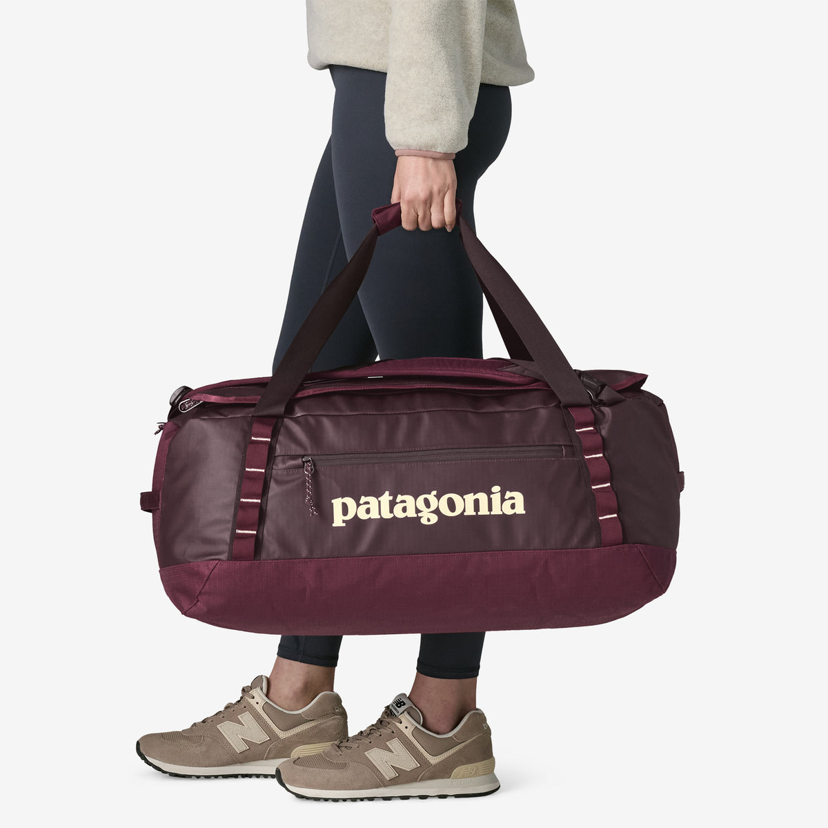 Patagonia Black Hole Duffel 55L in Berry Fig — lifestyle 2