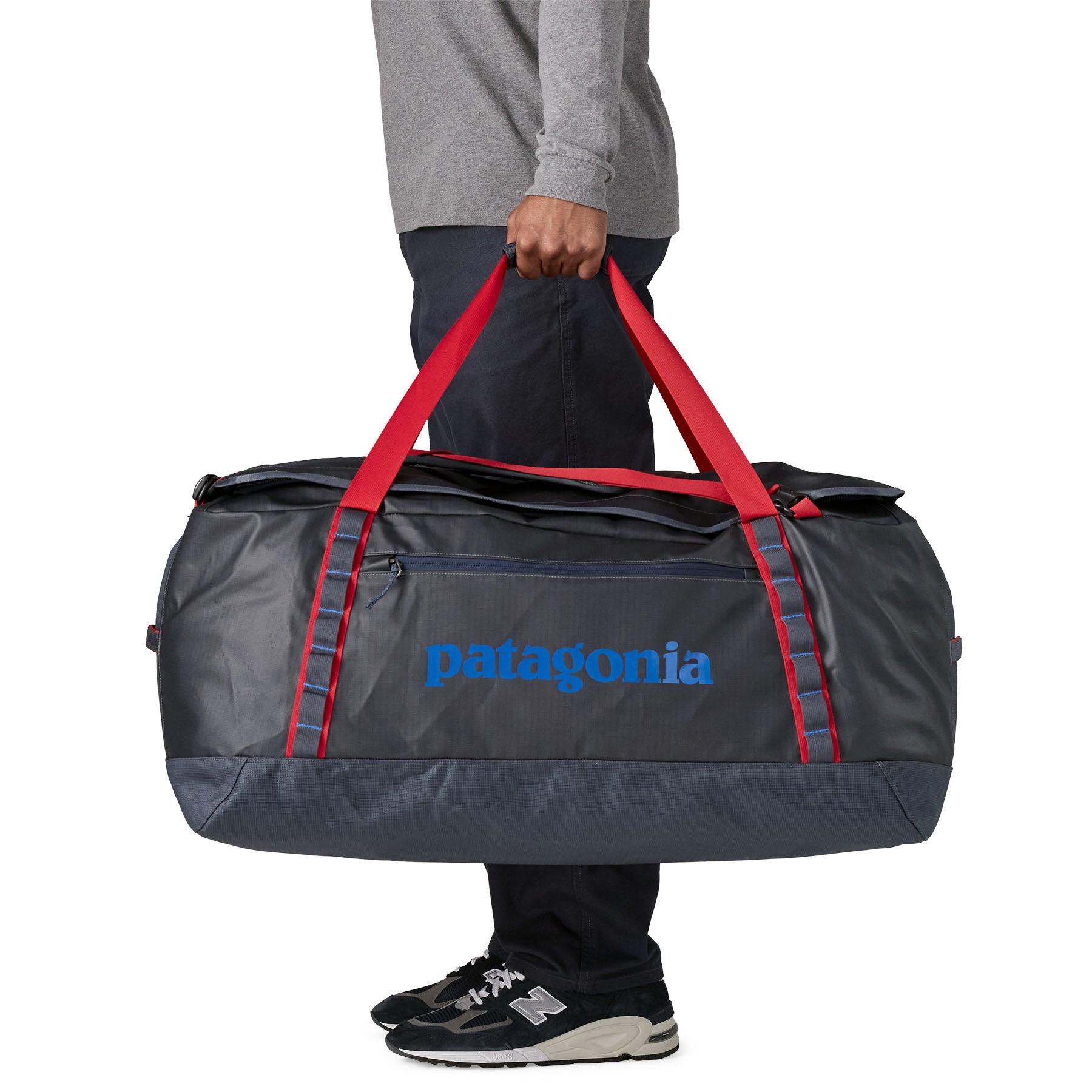 Patagonia Black Hole Duffel 100L in Smolder Blue/Amanita Red — lifestyle 2