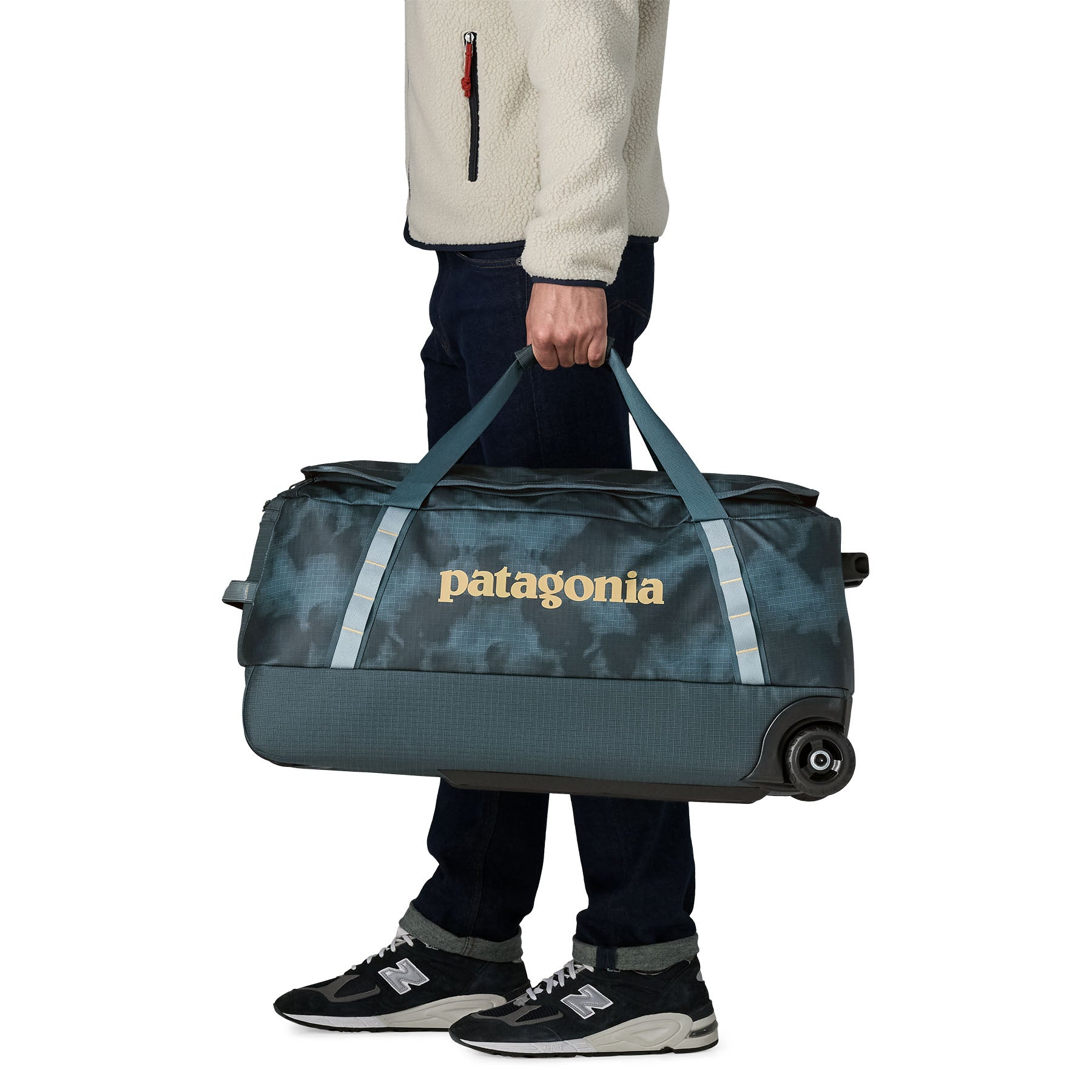 Patagonia Black Hole Wheeled Duffel 70L in Sastrugi: Summit Blue — lifestyle 2