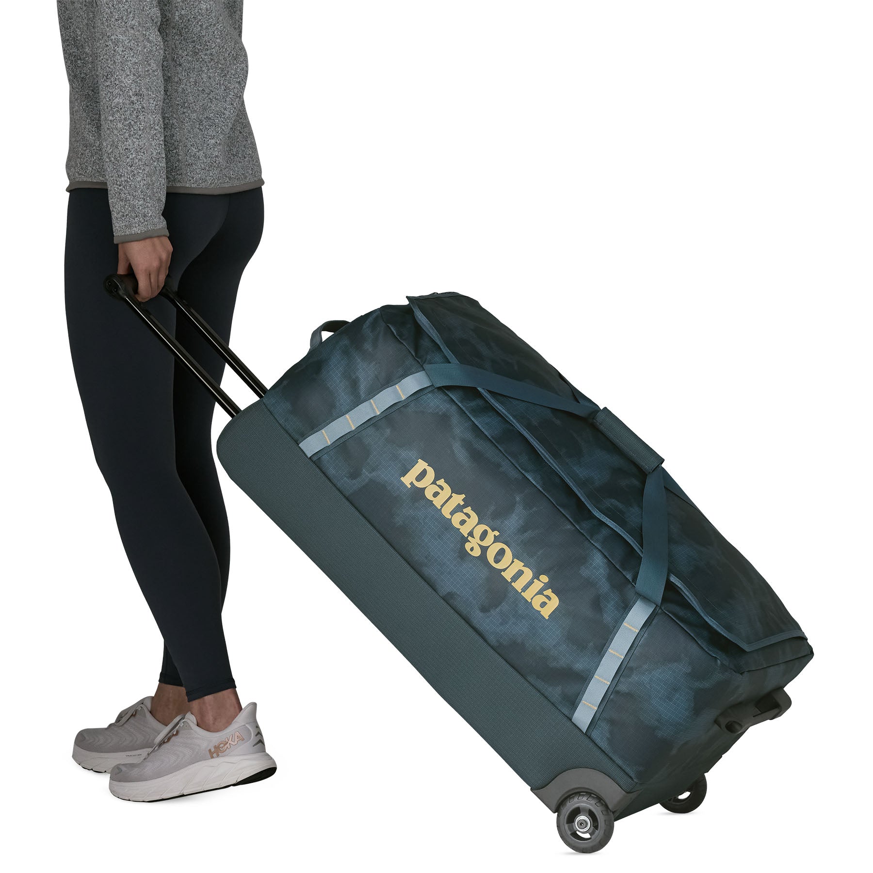 Patagonia Black Hole Wheeled Duffel 100L in Sastrugi: Summit Blue — lifestyle
