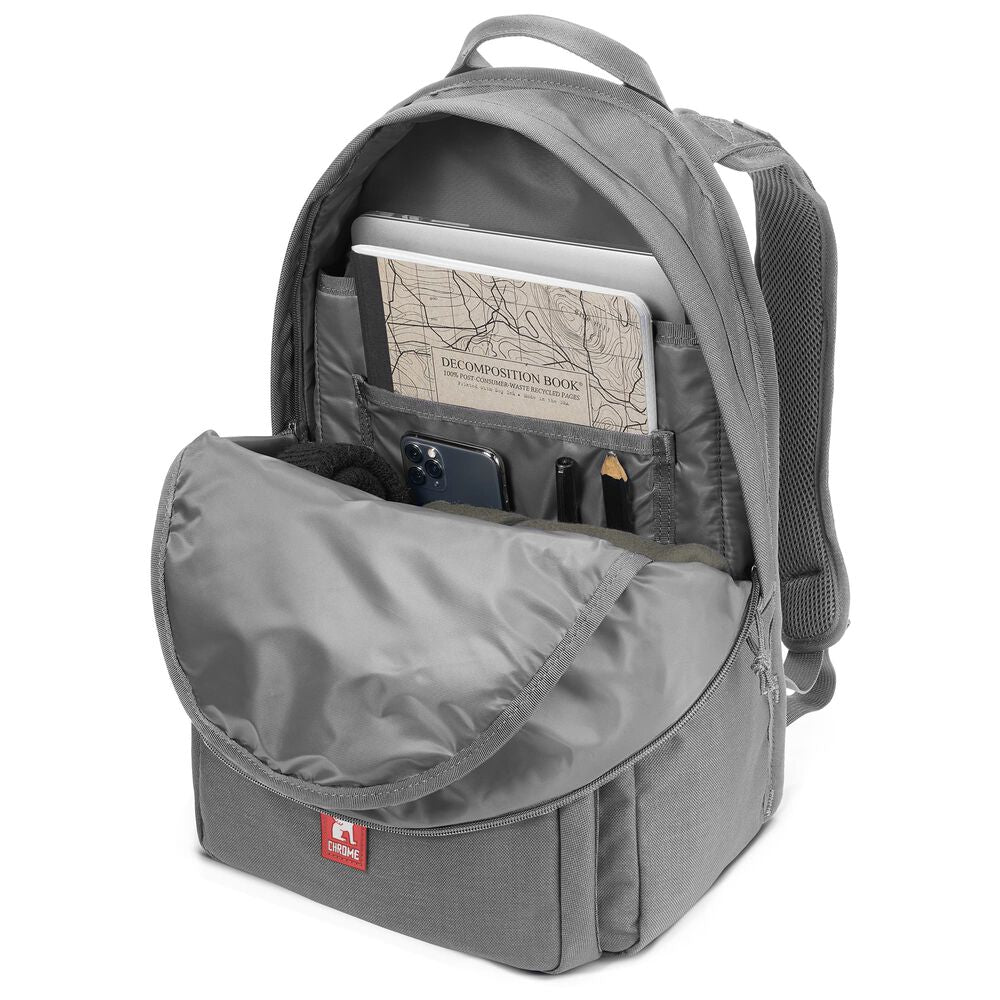 Chrome Industries Naito Pack backpack – grey, main compartment open showing a laptop and map